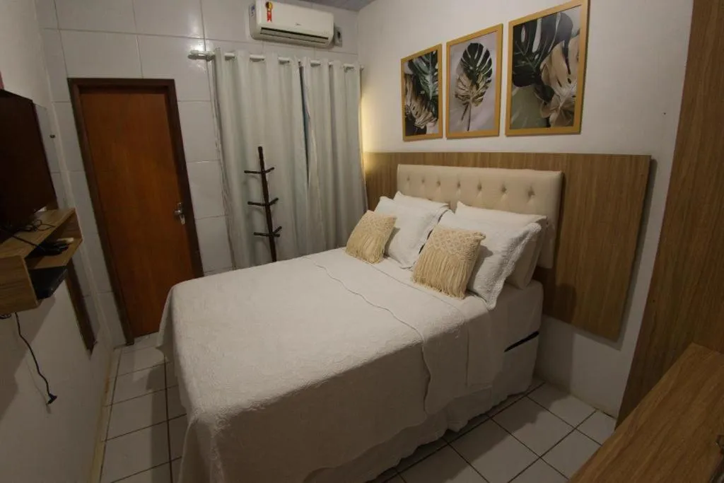 Bed in Pousada da Leide