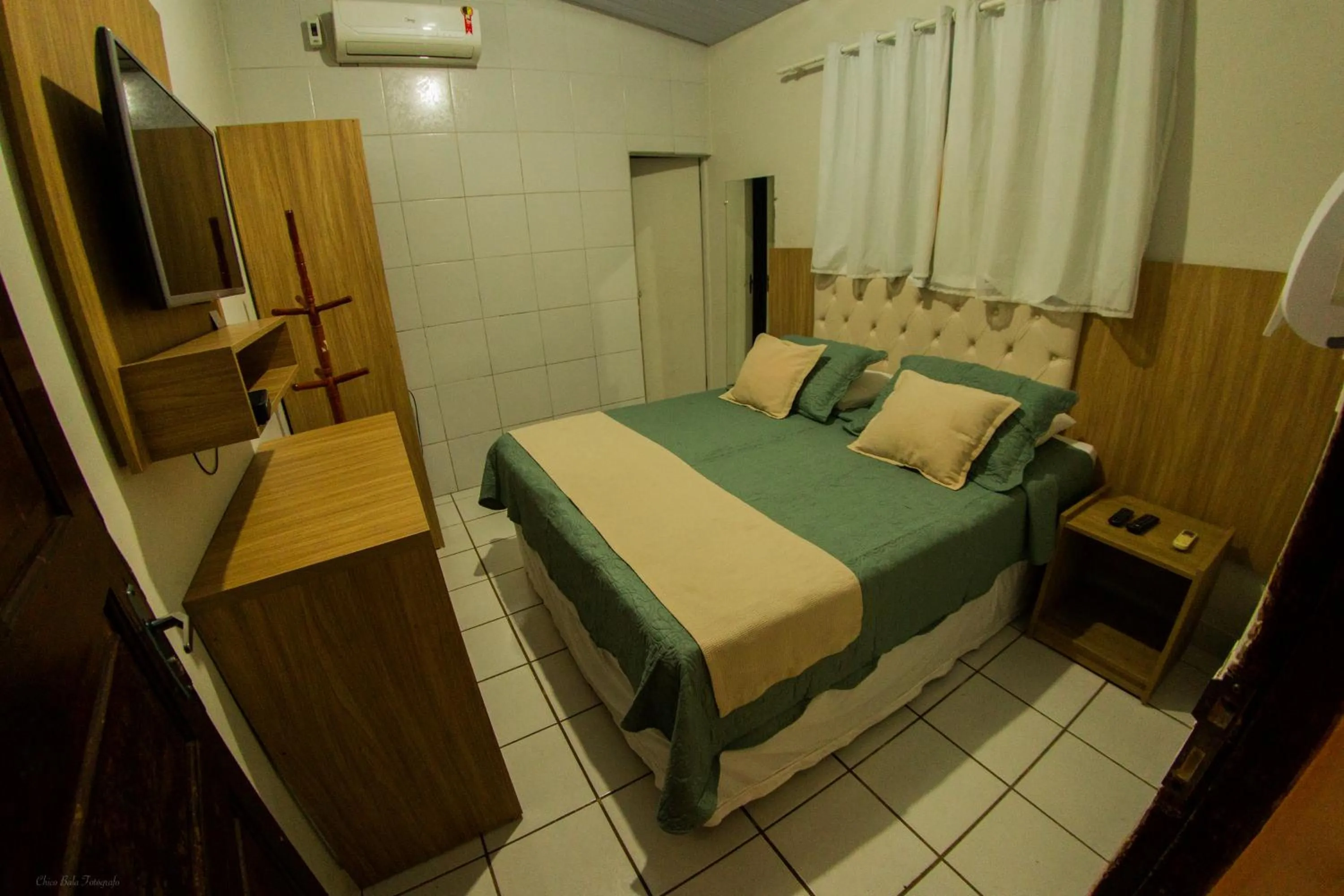 Bed in Pousada da Leide