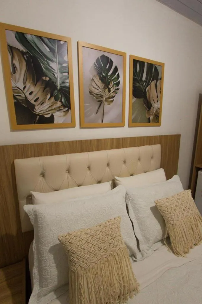 Bed in Pousada da Leide