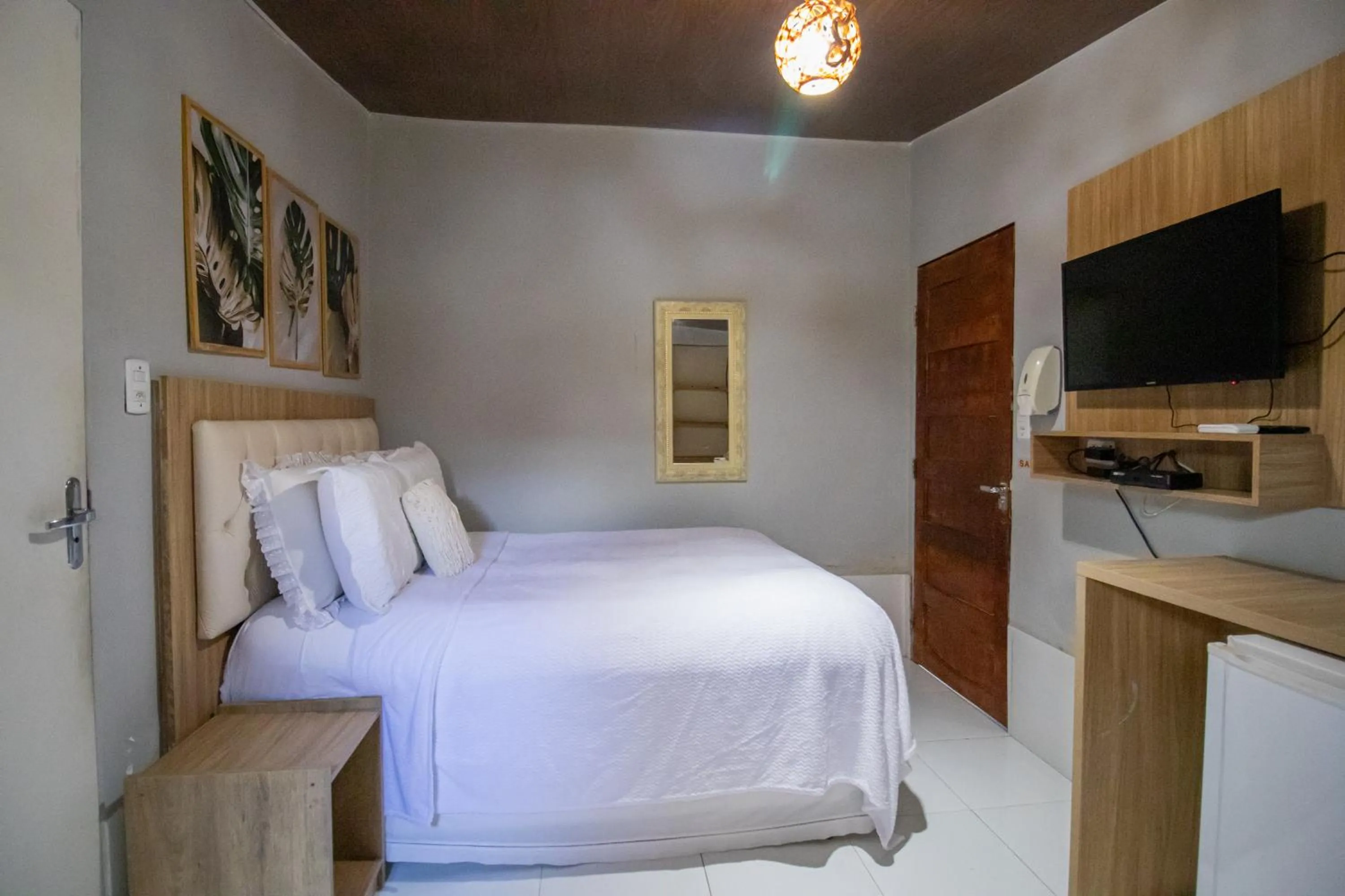 Bed in Pousada da Leide