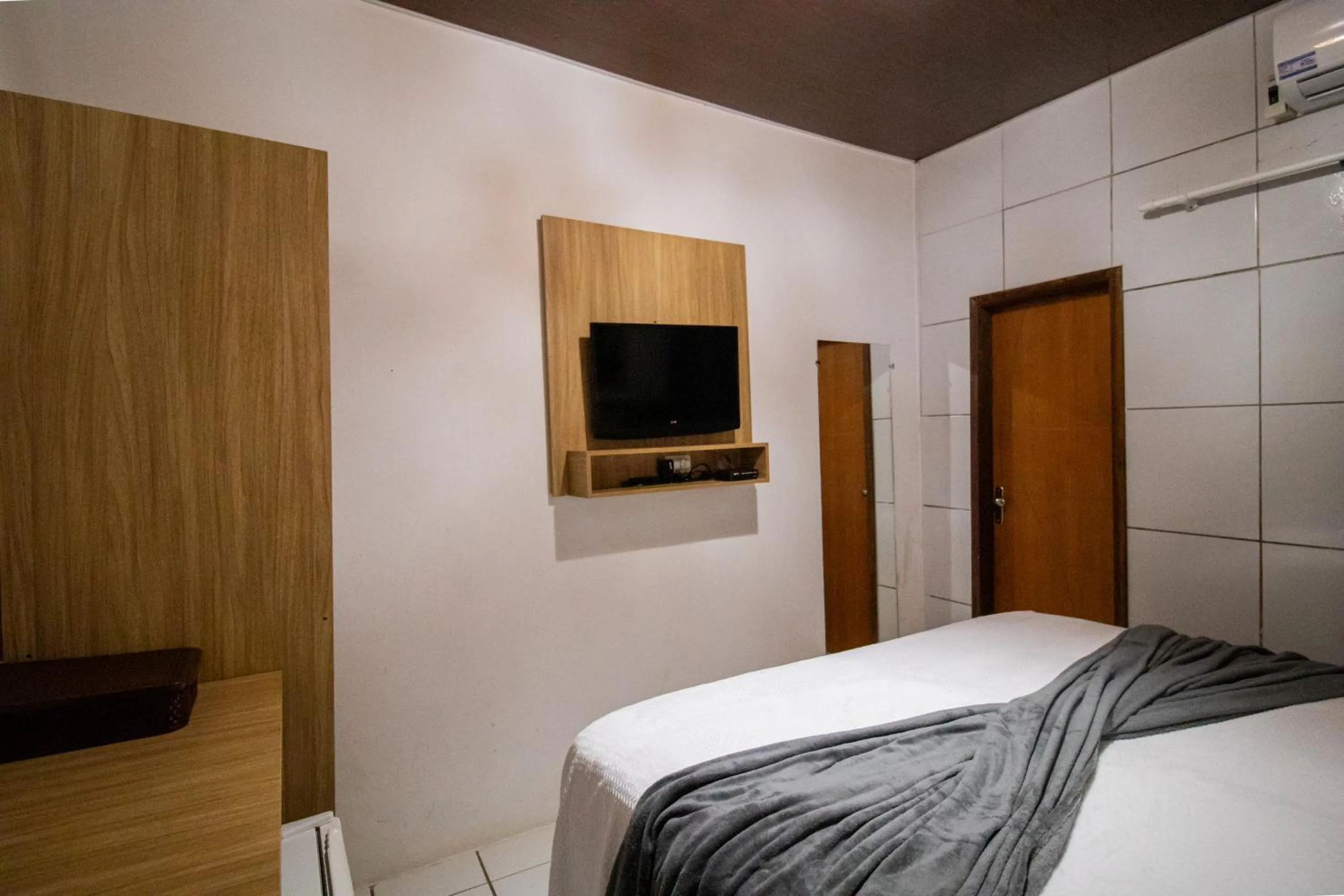 Bed in Pousada da Leide