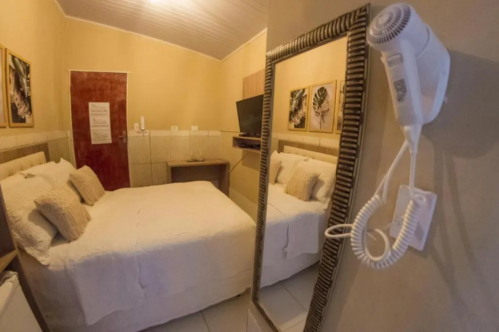 Bed in Pousada da Leide