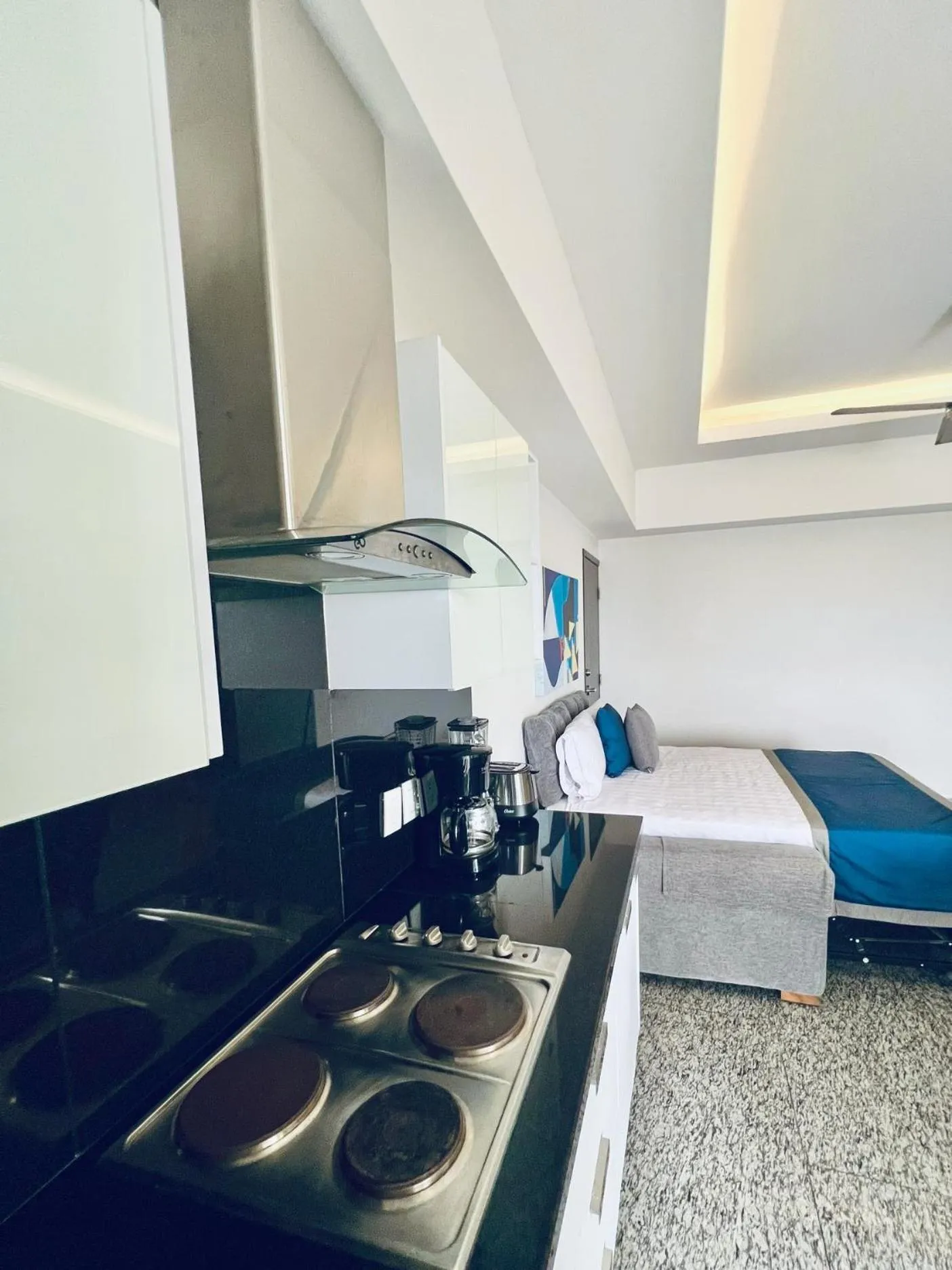 stove, Bed in Los Picos Hotel & Suites Bucerias