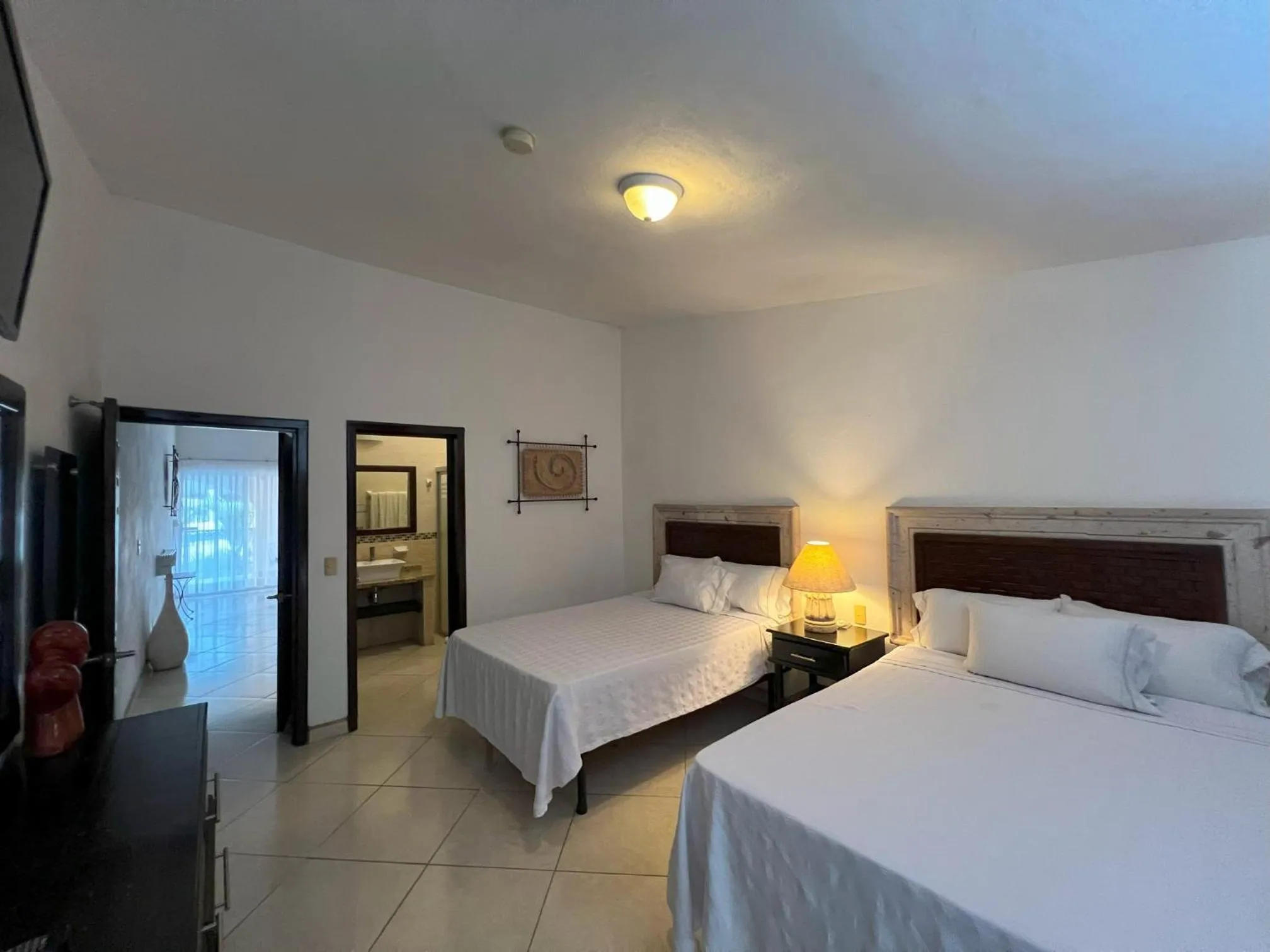 Bed in Los Picos Hotel & Suites Bucerias
