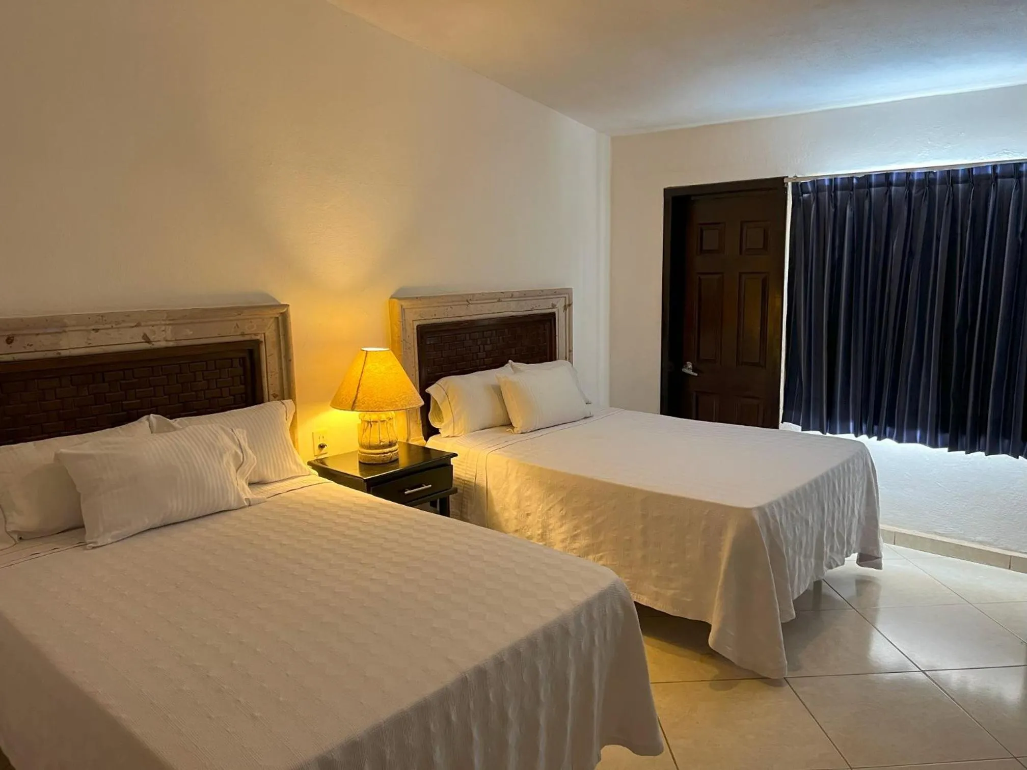 Bed in Los Picos Hotel & Suites Bucerias