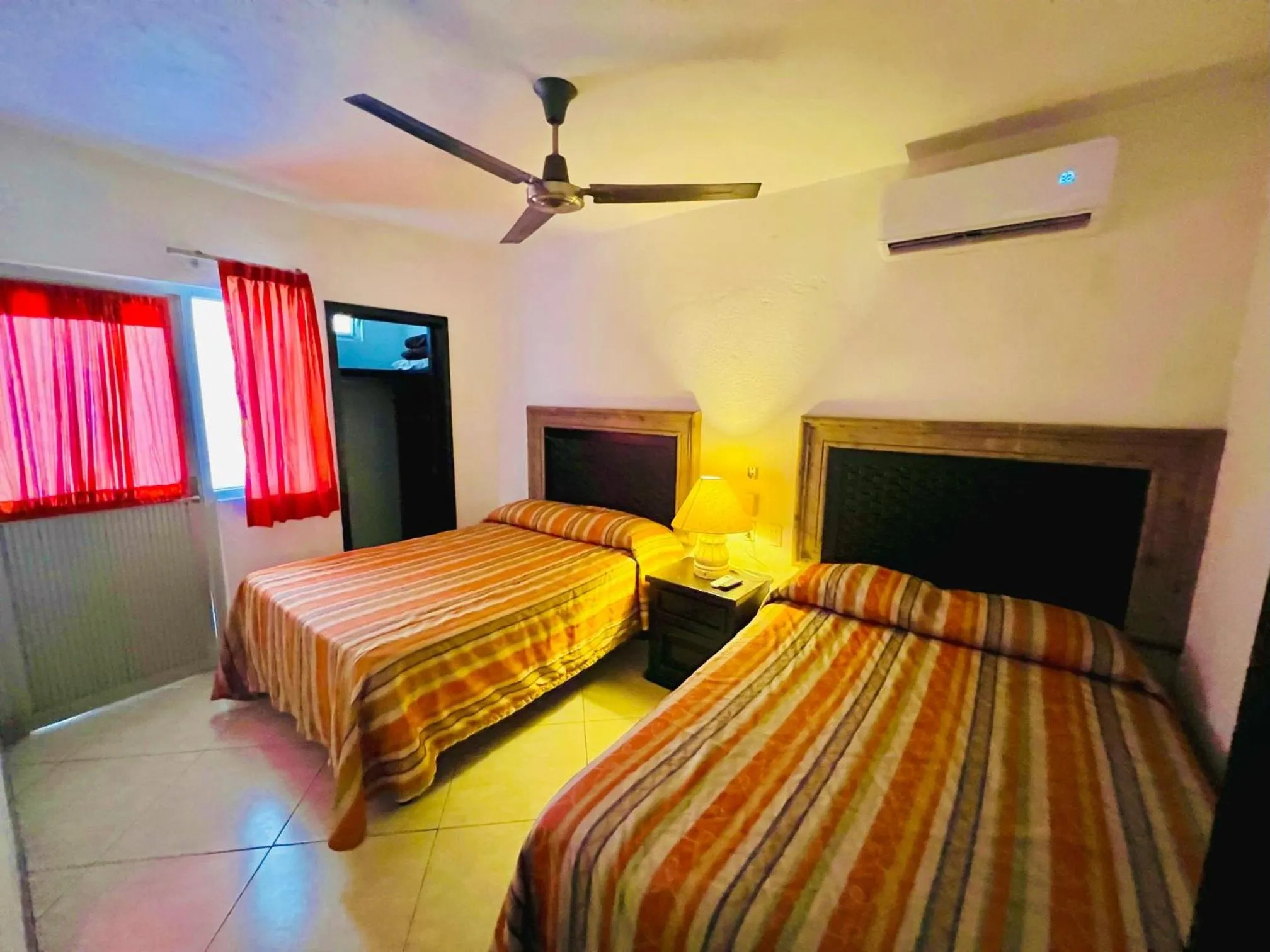 Bed in Los Picos Hotel & Suites Bucerias