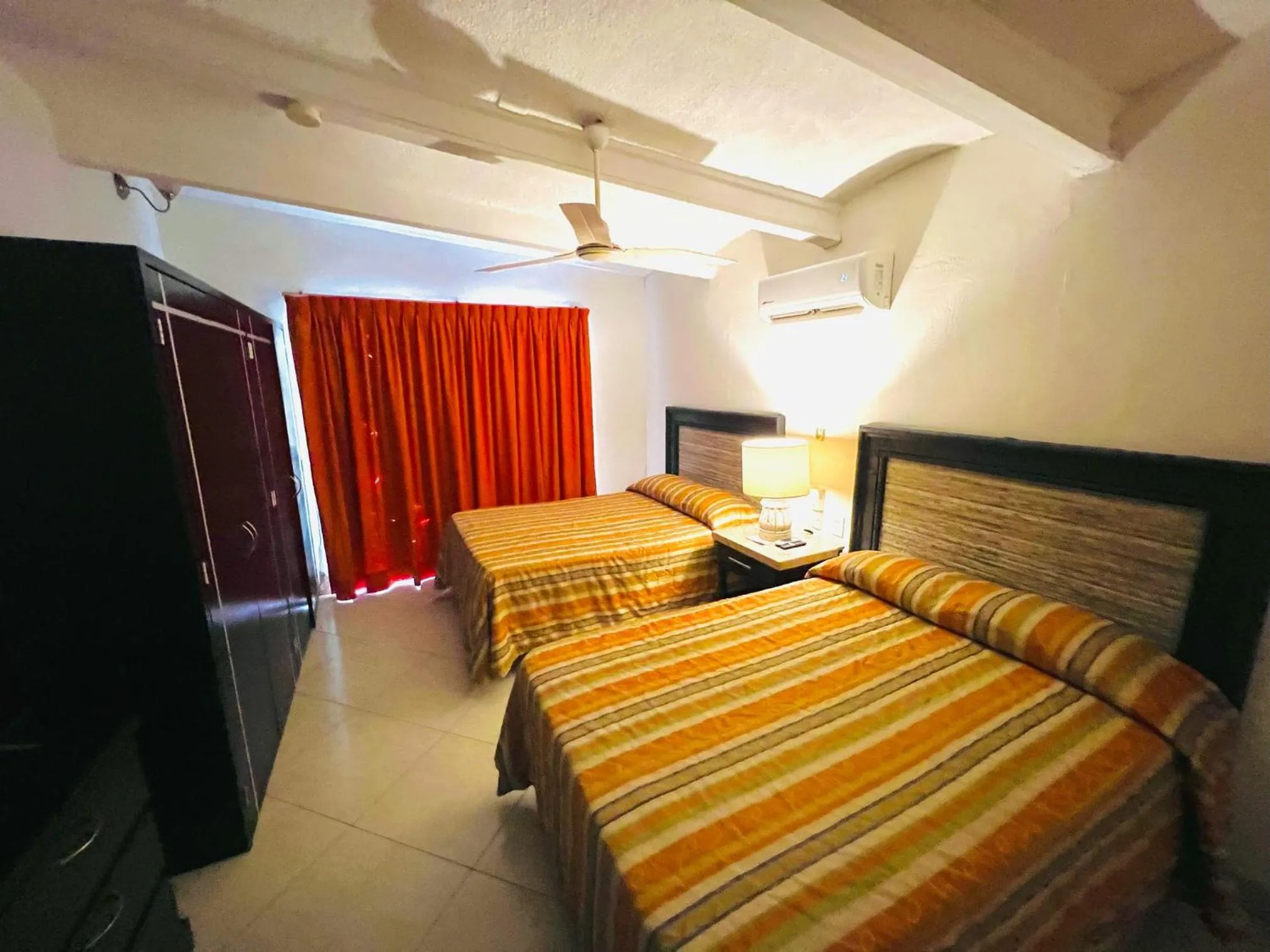 Bed in Los Picos Hotel & Suites Bucerias