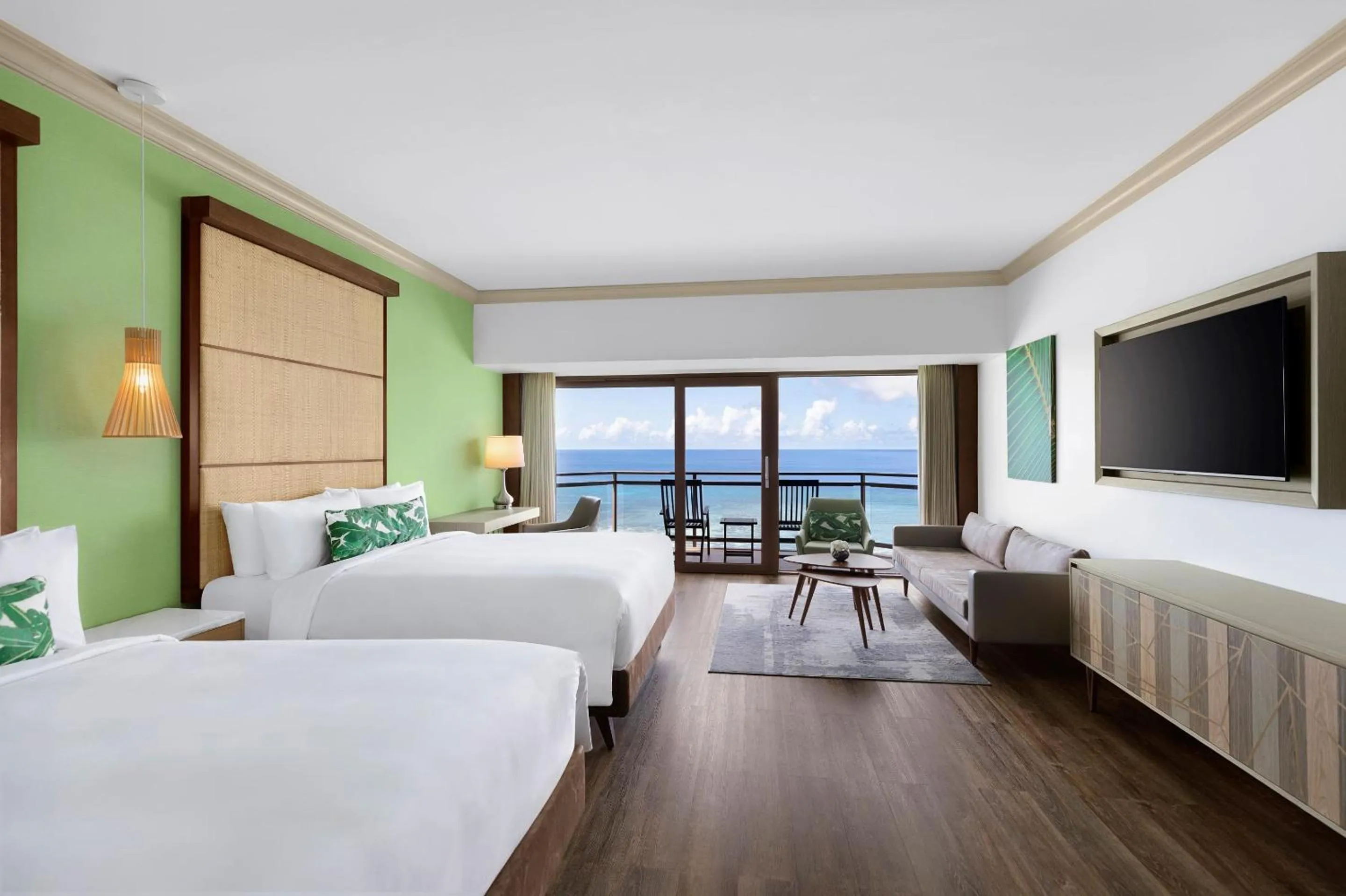 Communal lounge/ TV room, Bed in Dusit Beach Resort Guam