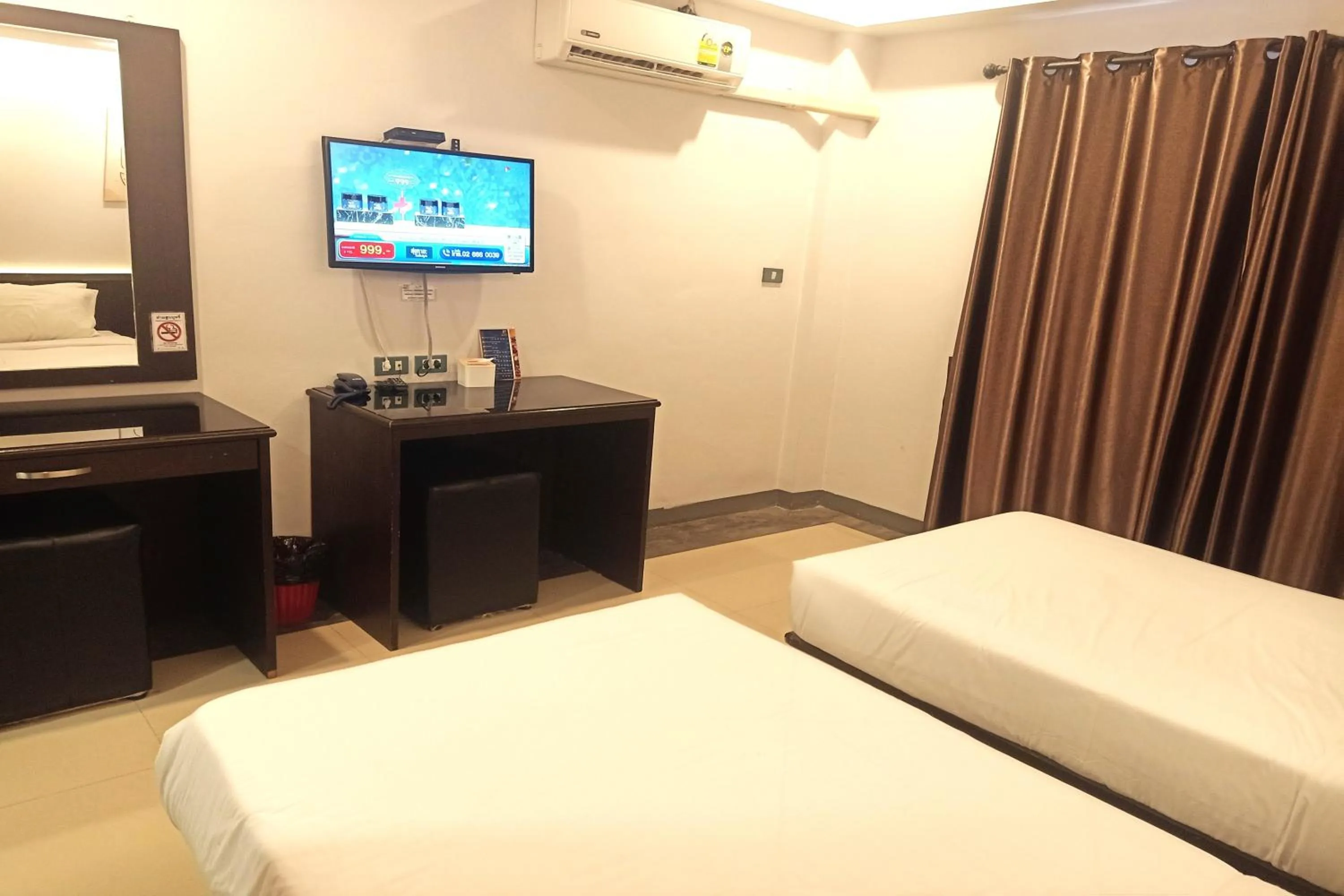 Bed in Smile Place Hotel Chiang Rai