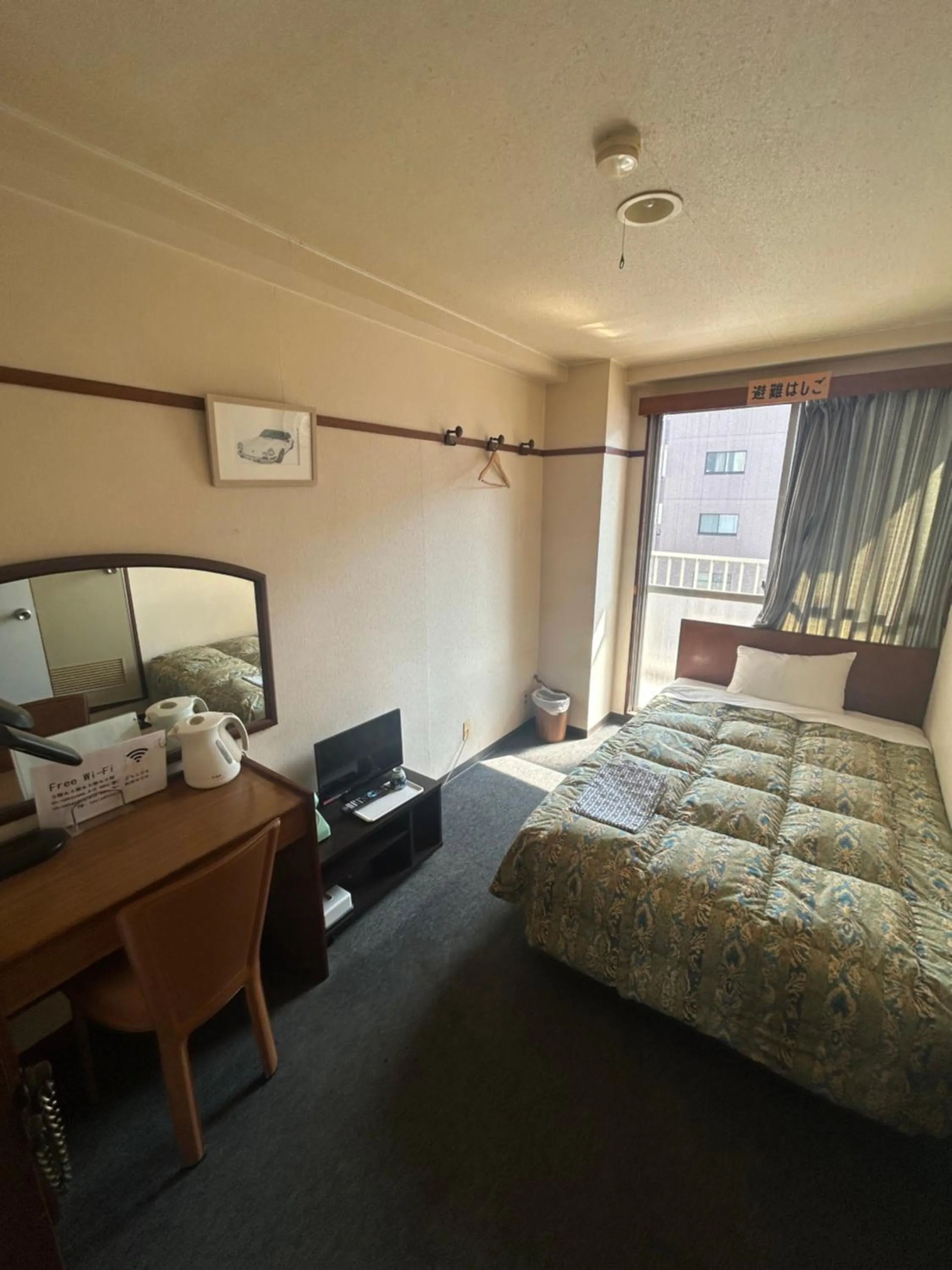 Bed in Business Hotel Nakayama