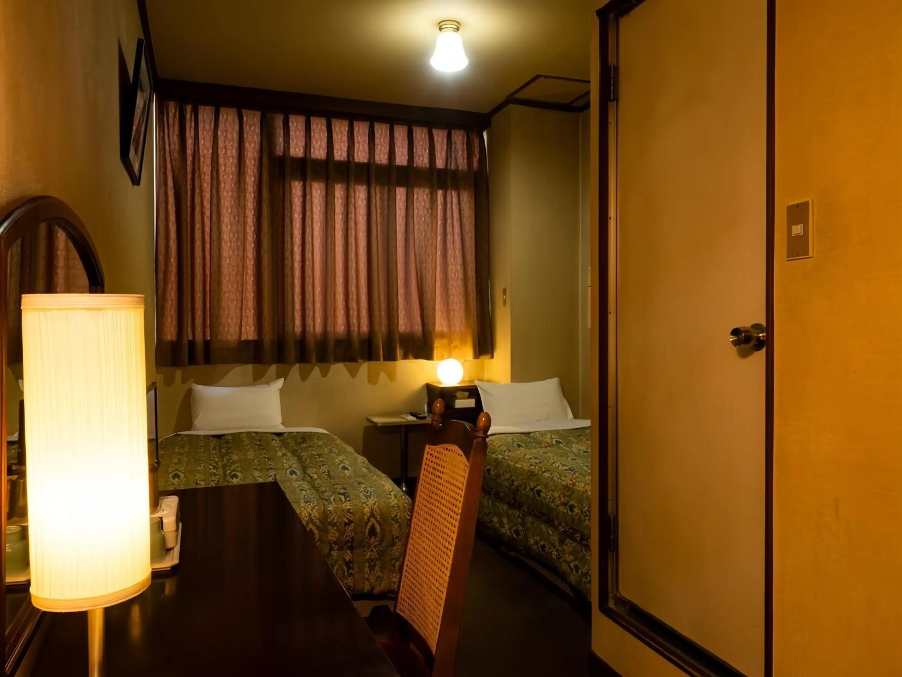 Bed in Business Hotel Nakayama