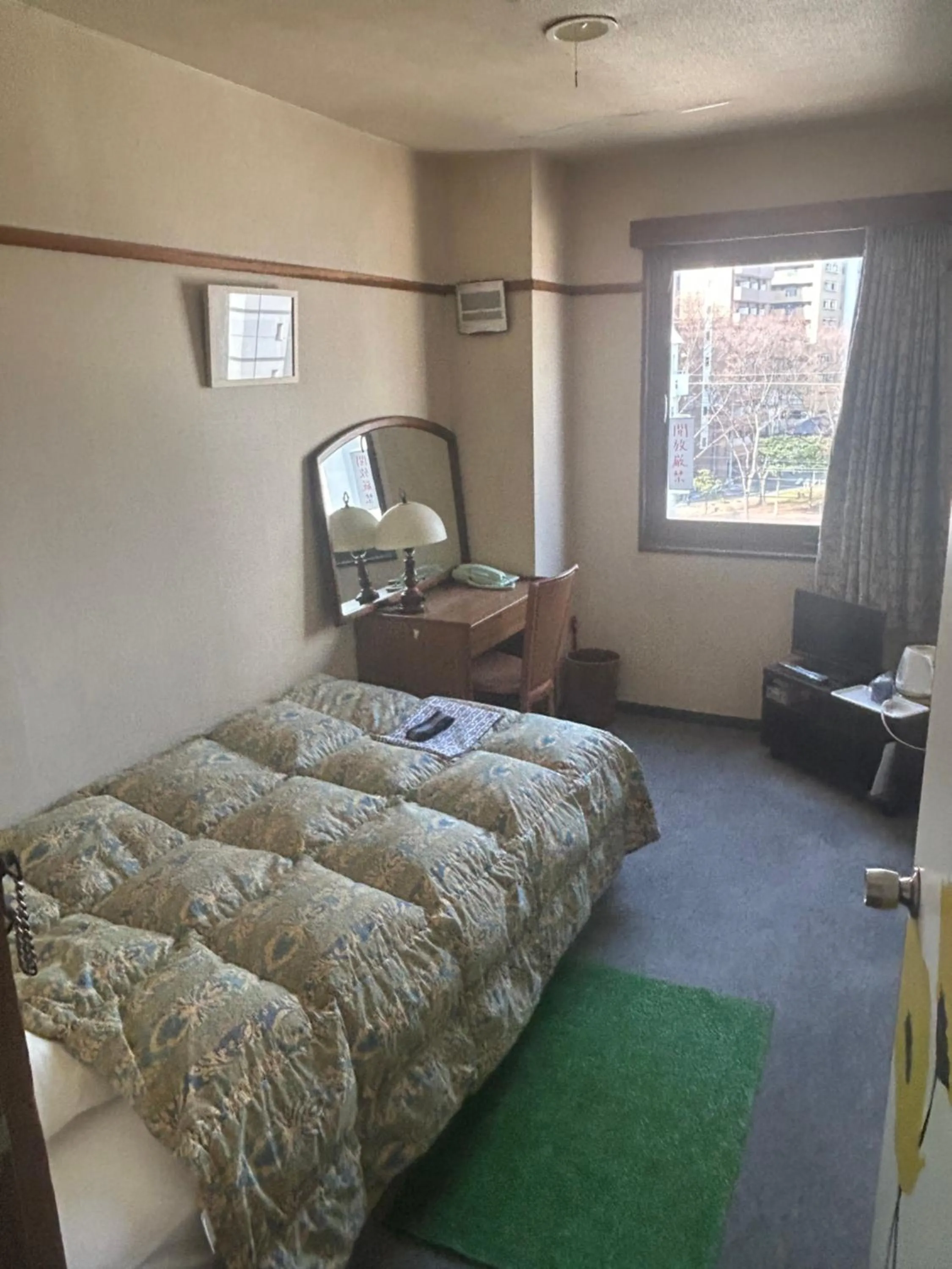 Bed in Business Hotel Nakayama