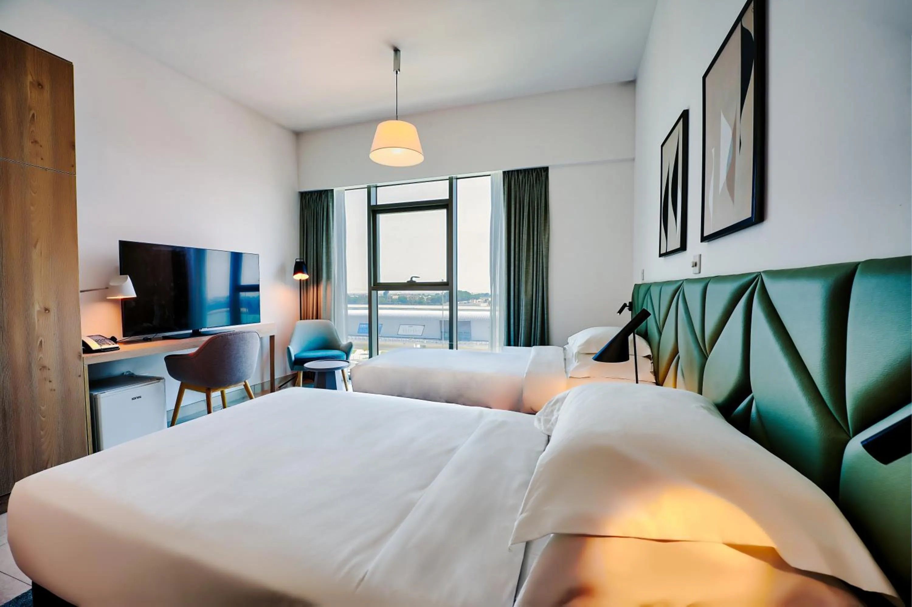 Bed in Capital Suites Hotel Apartments