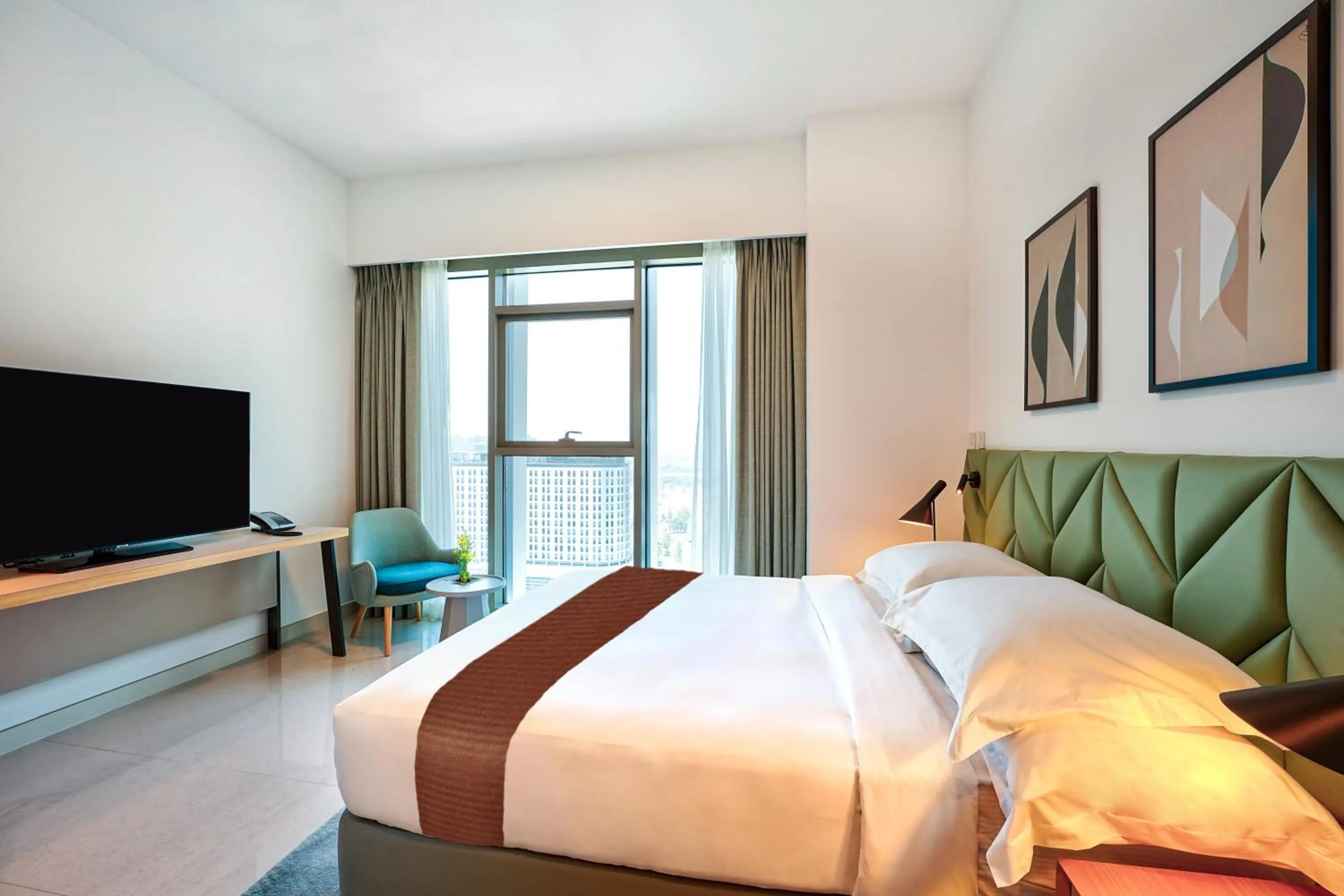 Bed in Capital Suites Hotel Apartments