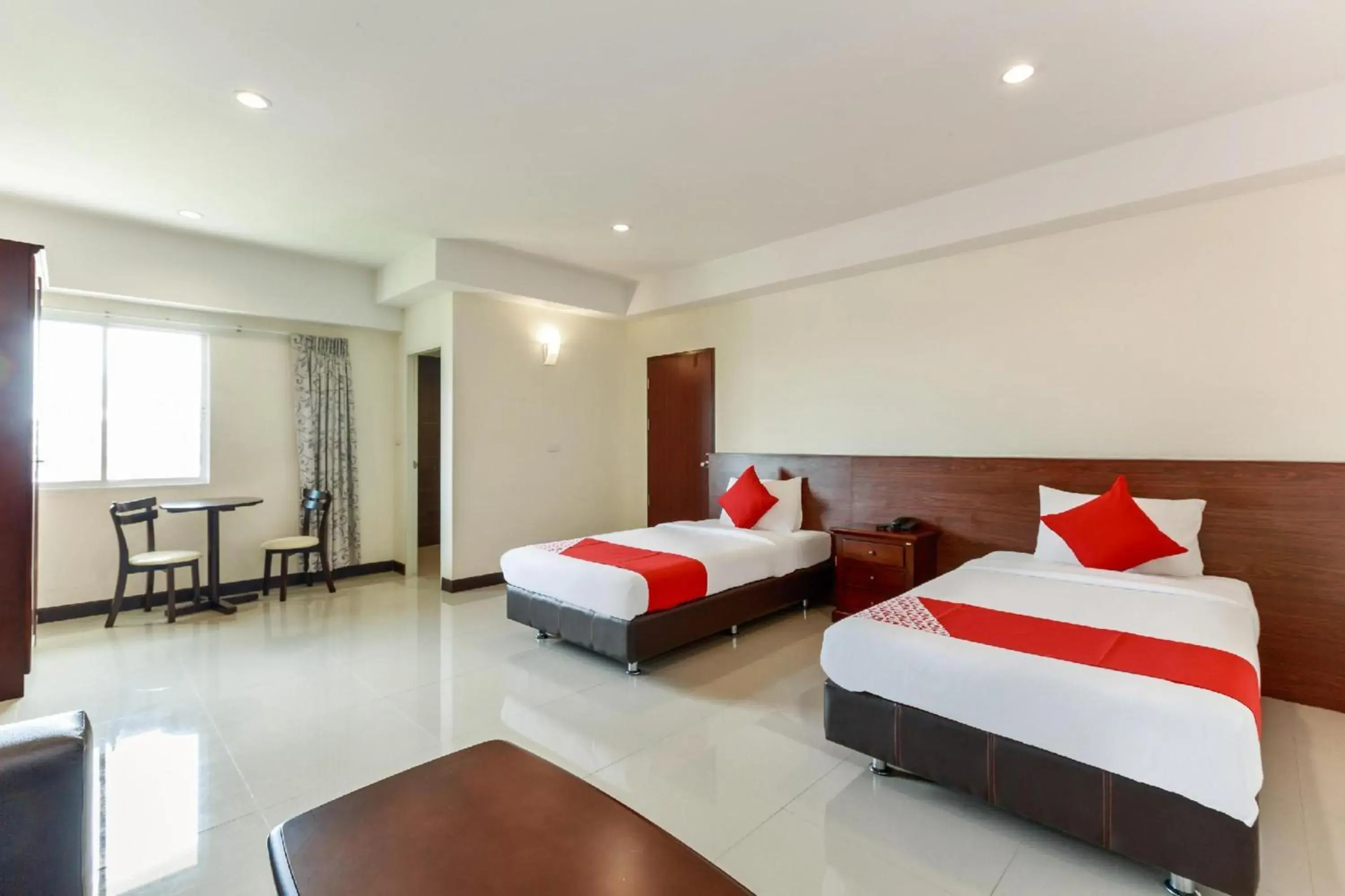 Deluxe Twin Room in Collection O VResotel Deluxe Twin Room in Collection O VResotel