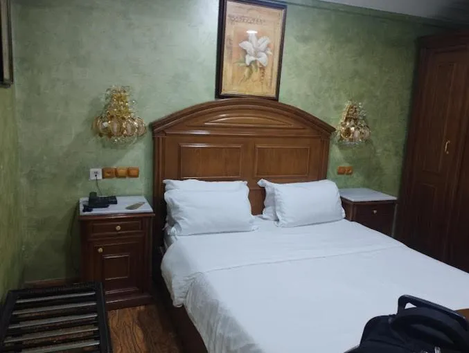 Bed in Hotel Ville Des Roses