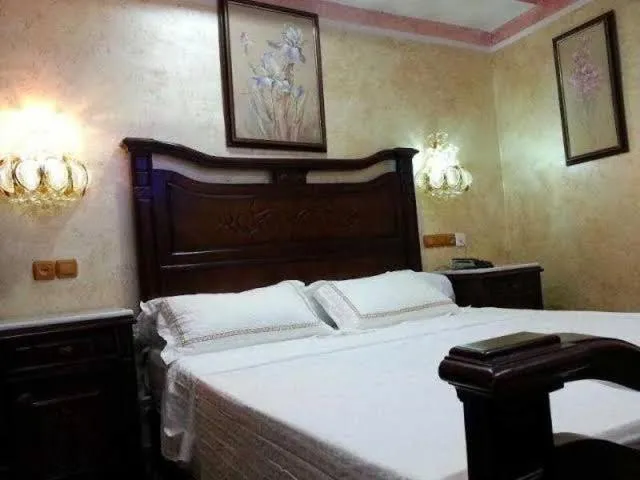 Bed in Hotel Ville Des Roses