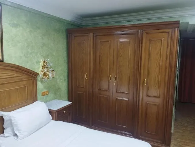 Bed in Hotel Ville Des Roses