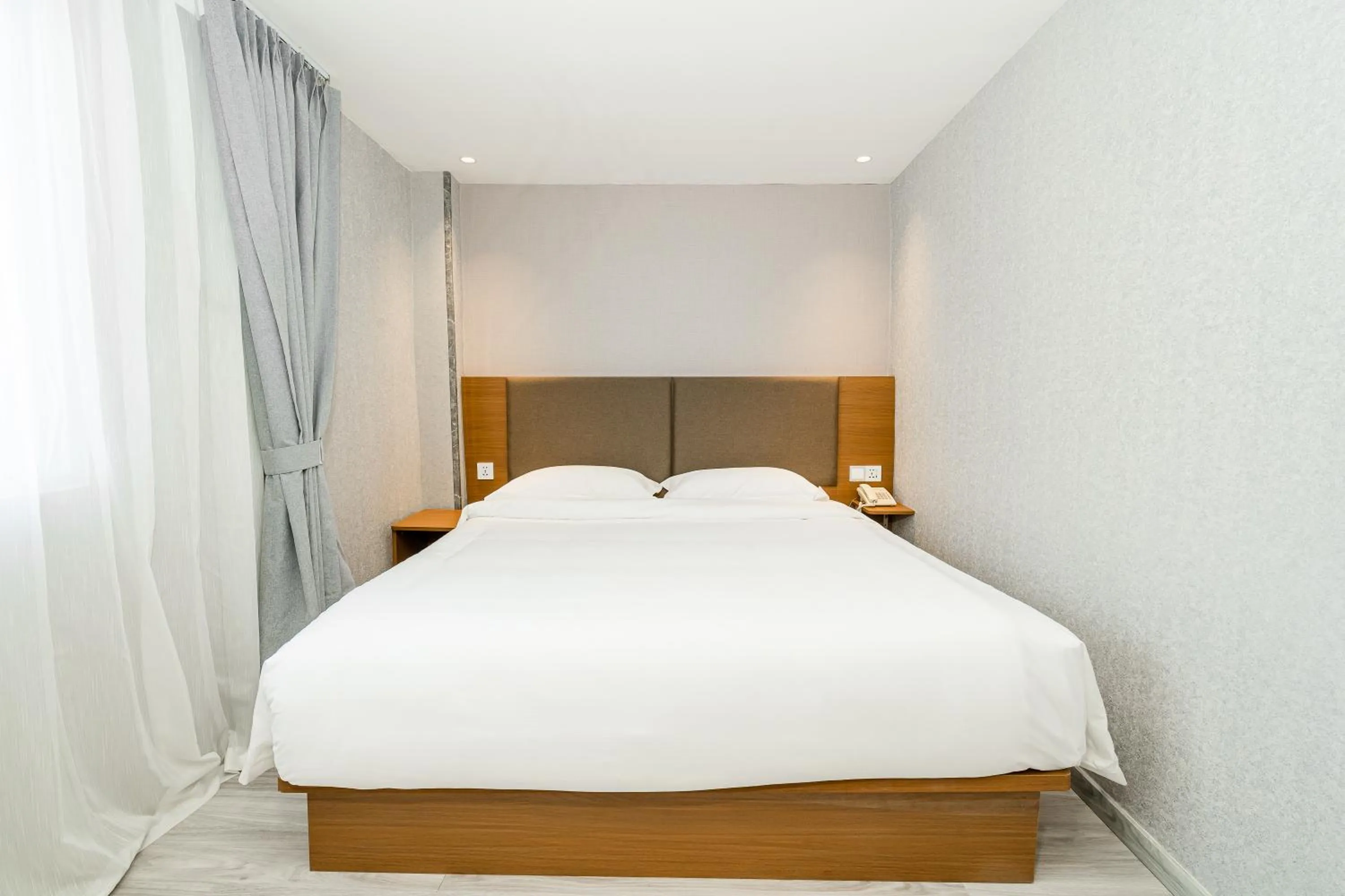 Bed in Aurea Delight Hotel