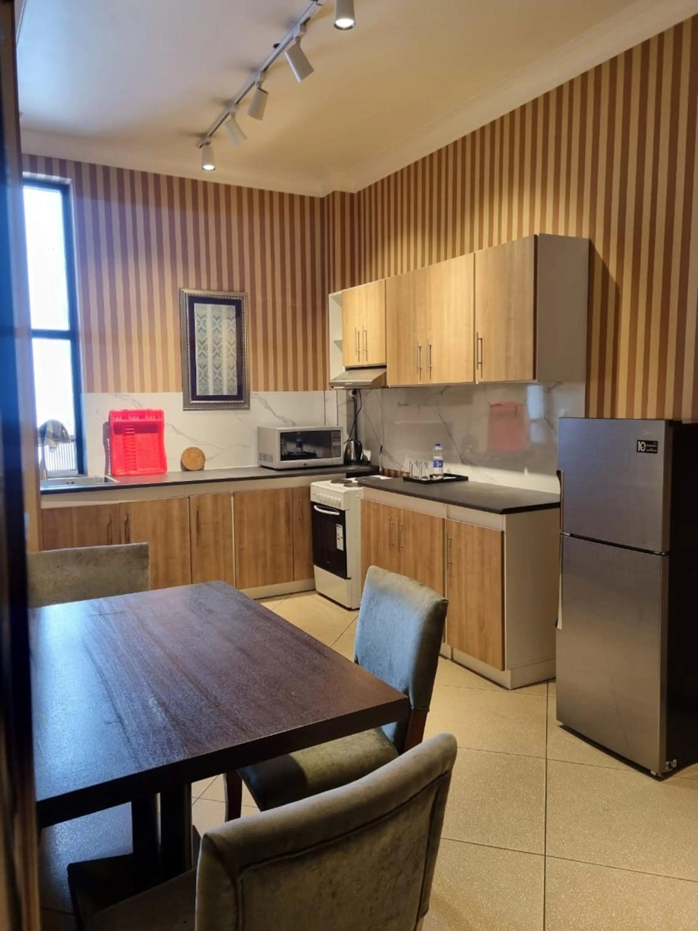 Kitchen or kitchenette in The Residence Hotel
