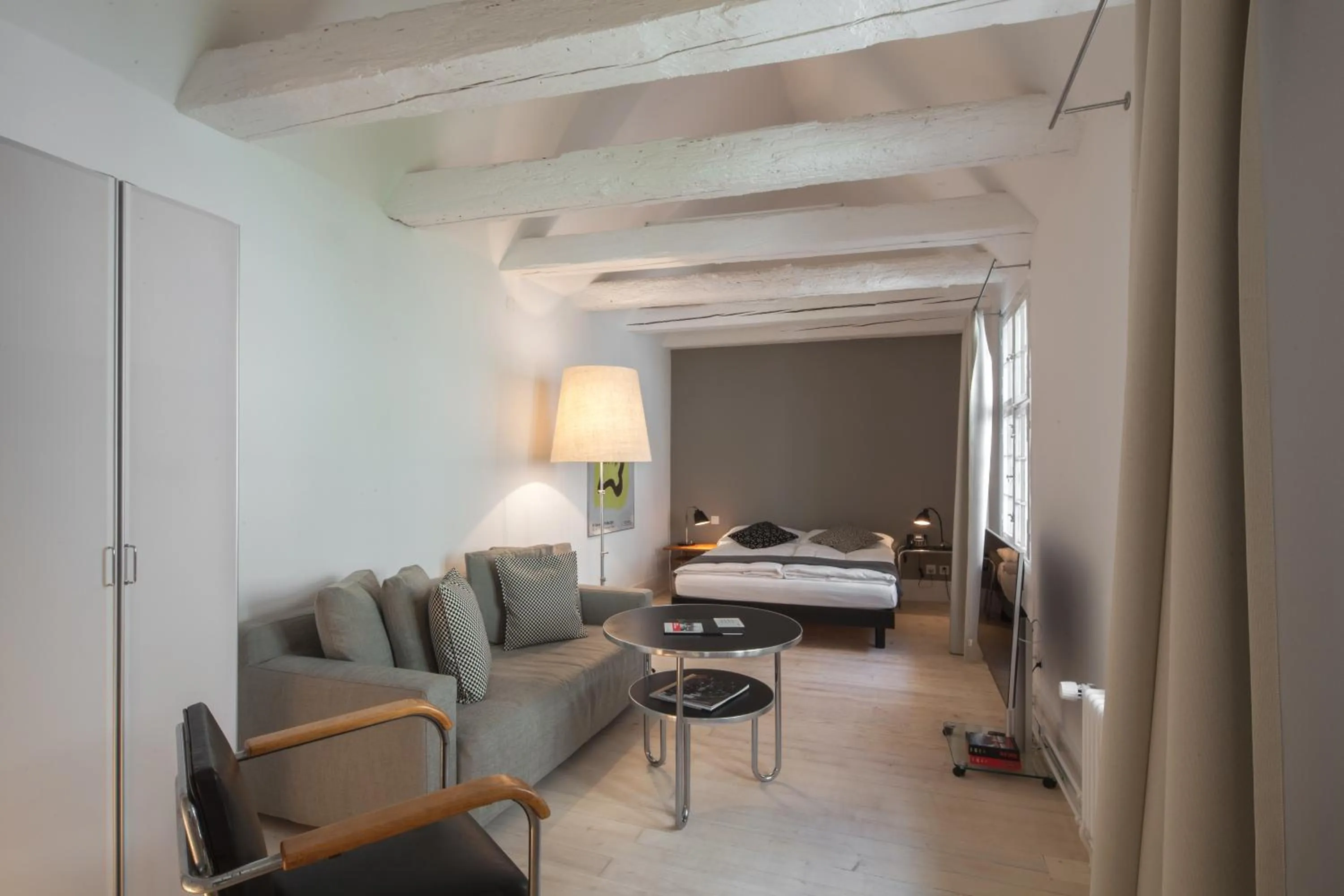 Seating area, Bed in Baseltor Hotel & Restaurant