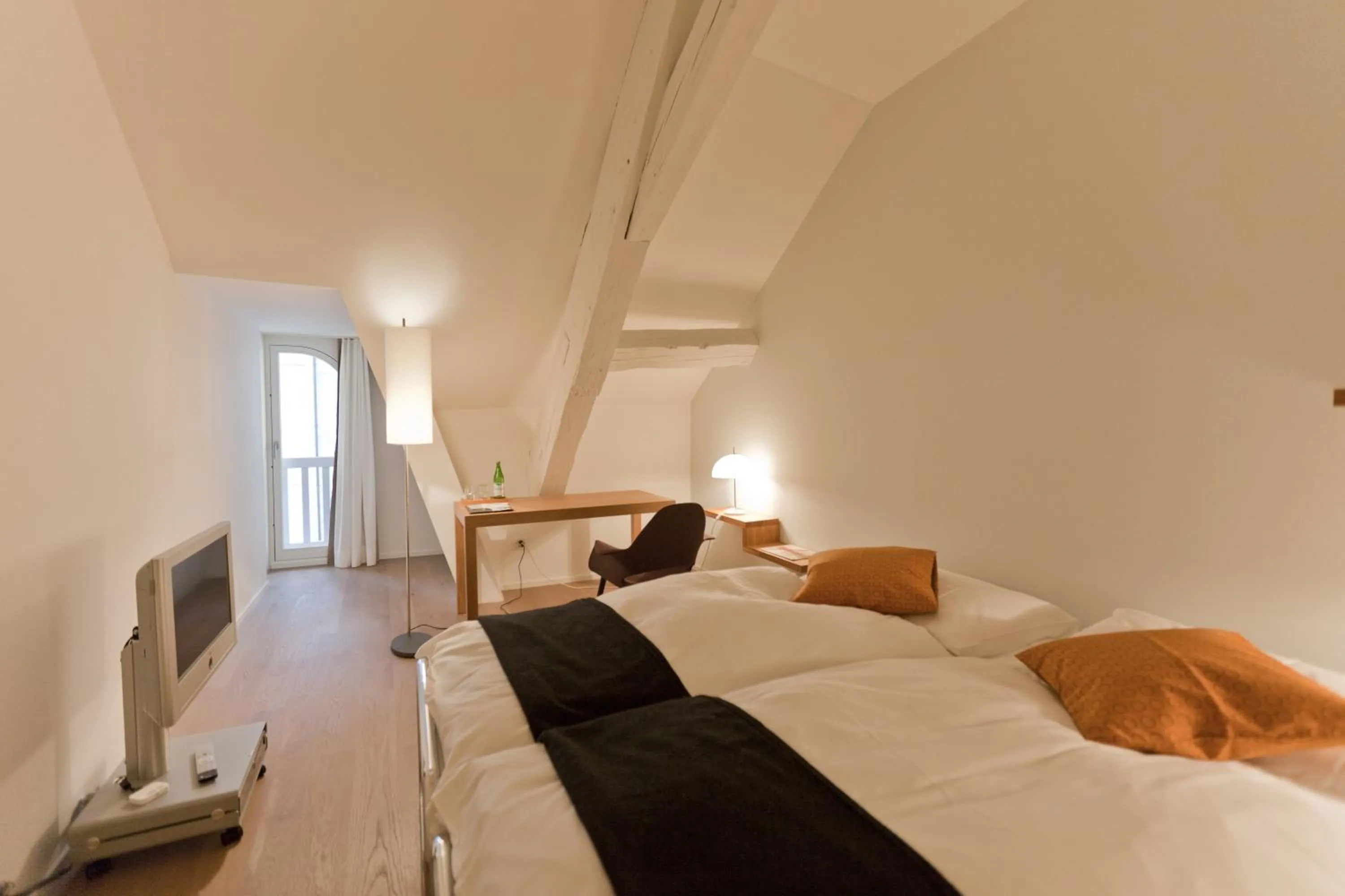 Bed in Baseltor Hotel & Restaurant