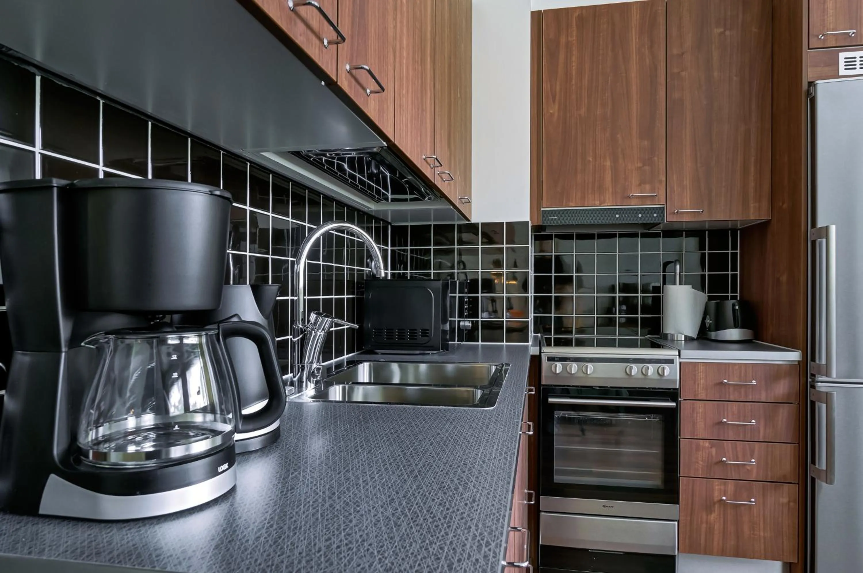 Kitchen or kitchenette in Forenom Serviced Apartments Espoo Tapiola