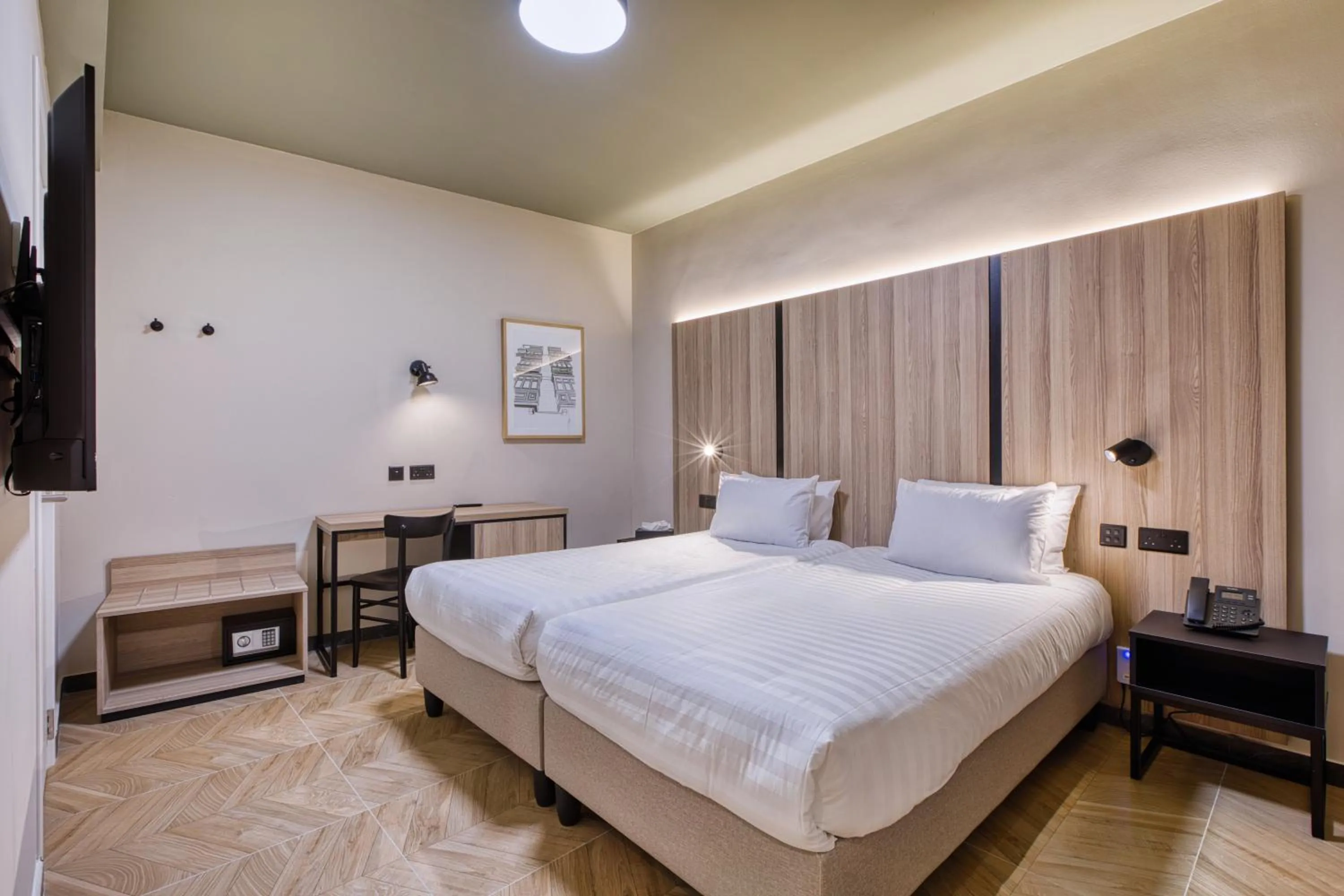 Bed in VITA Hotel & Rooftop