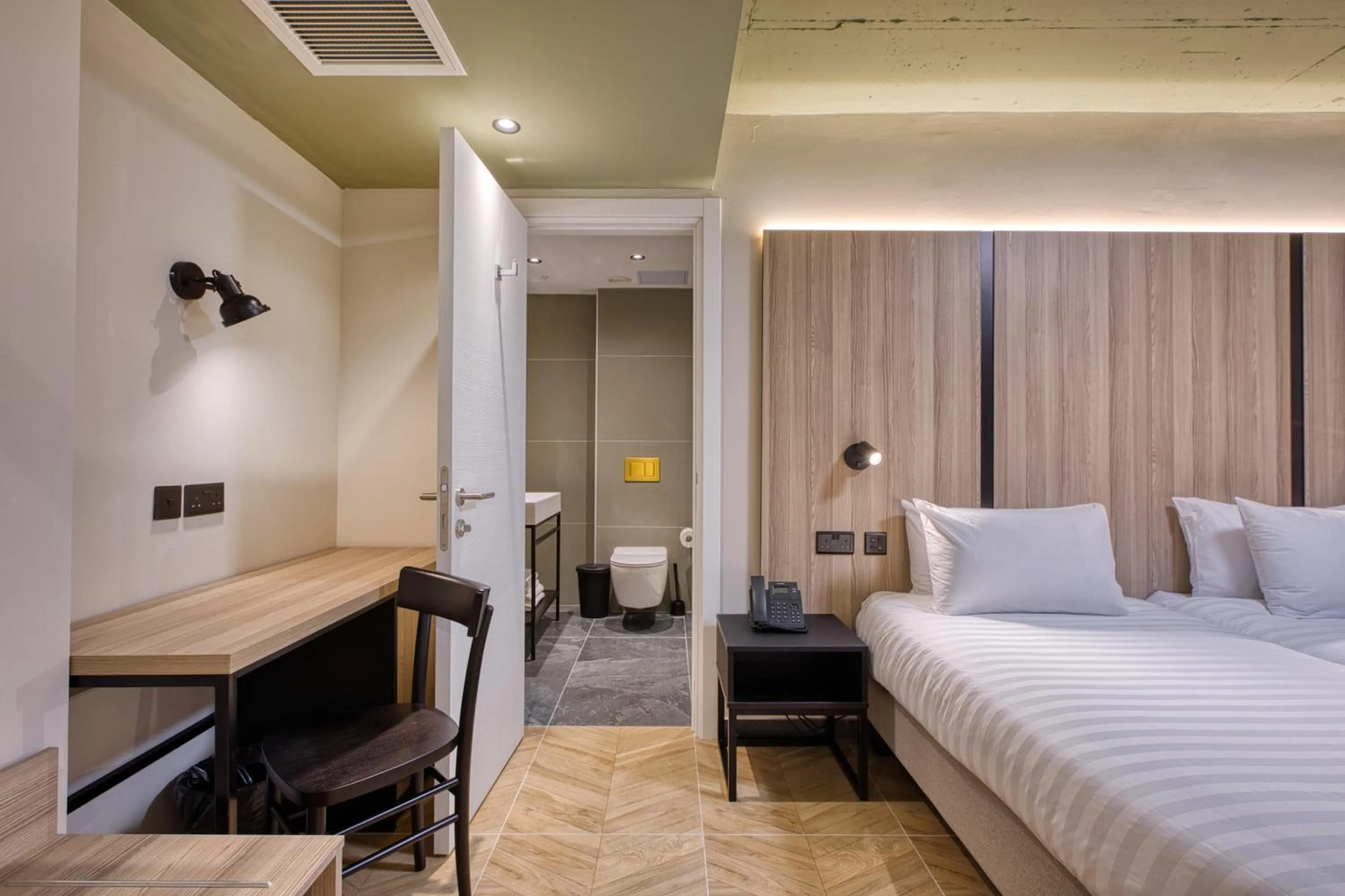 Bed in VITA Hotel & Rooftop