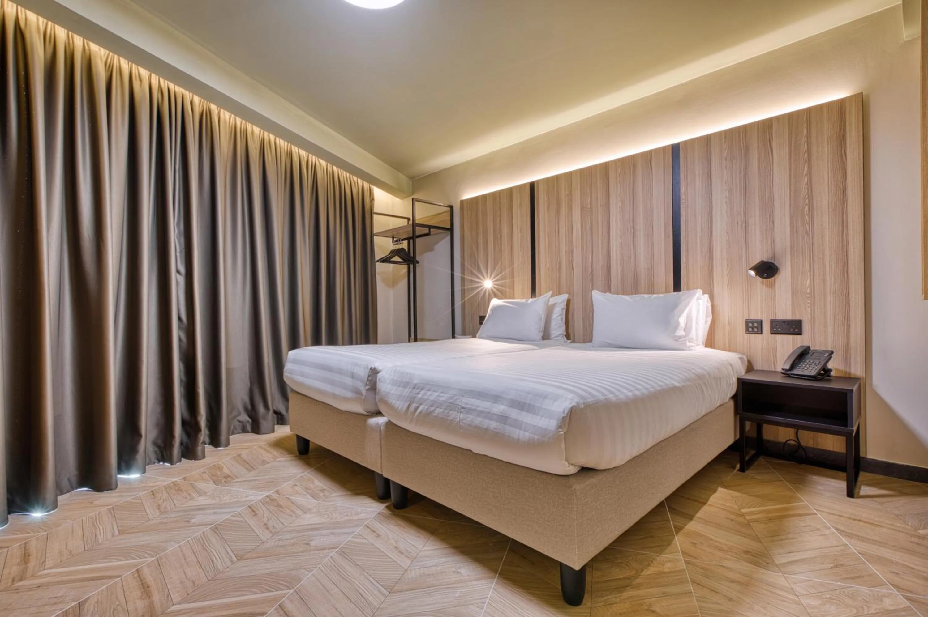 Bed in VITA Hotel & Rooftop