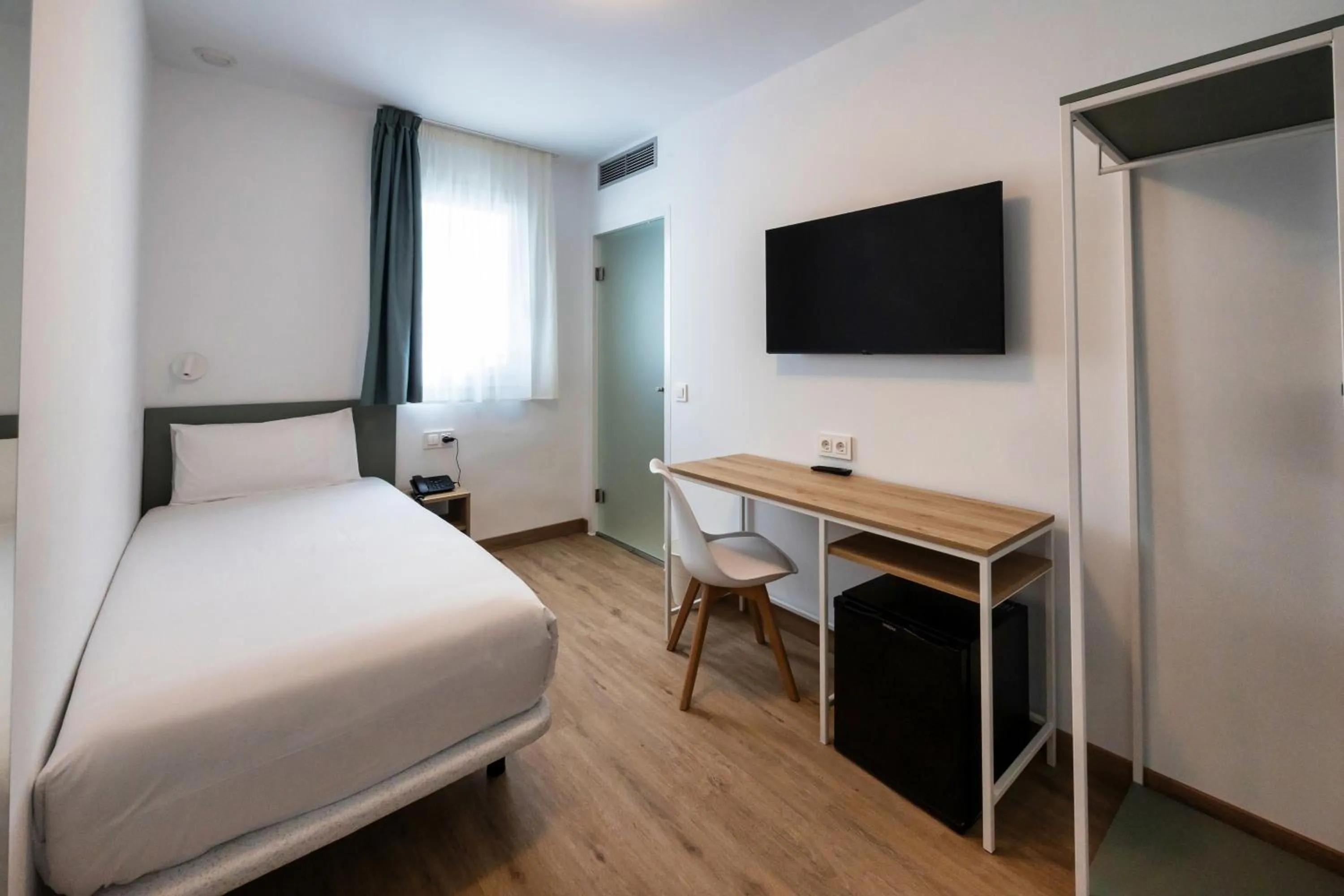 Bed in Hotel Calella by Beatriz Hoteles