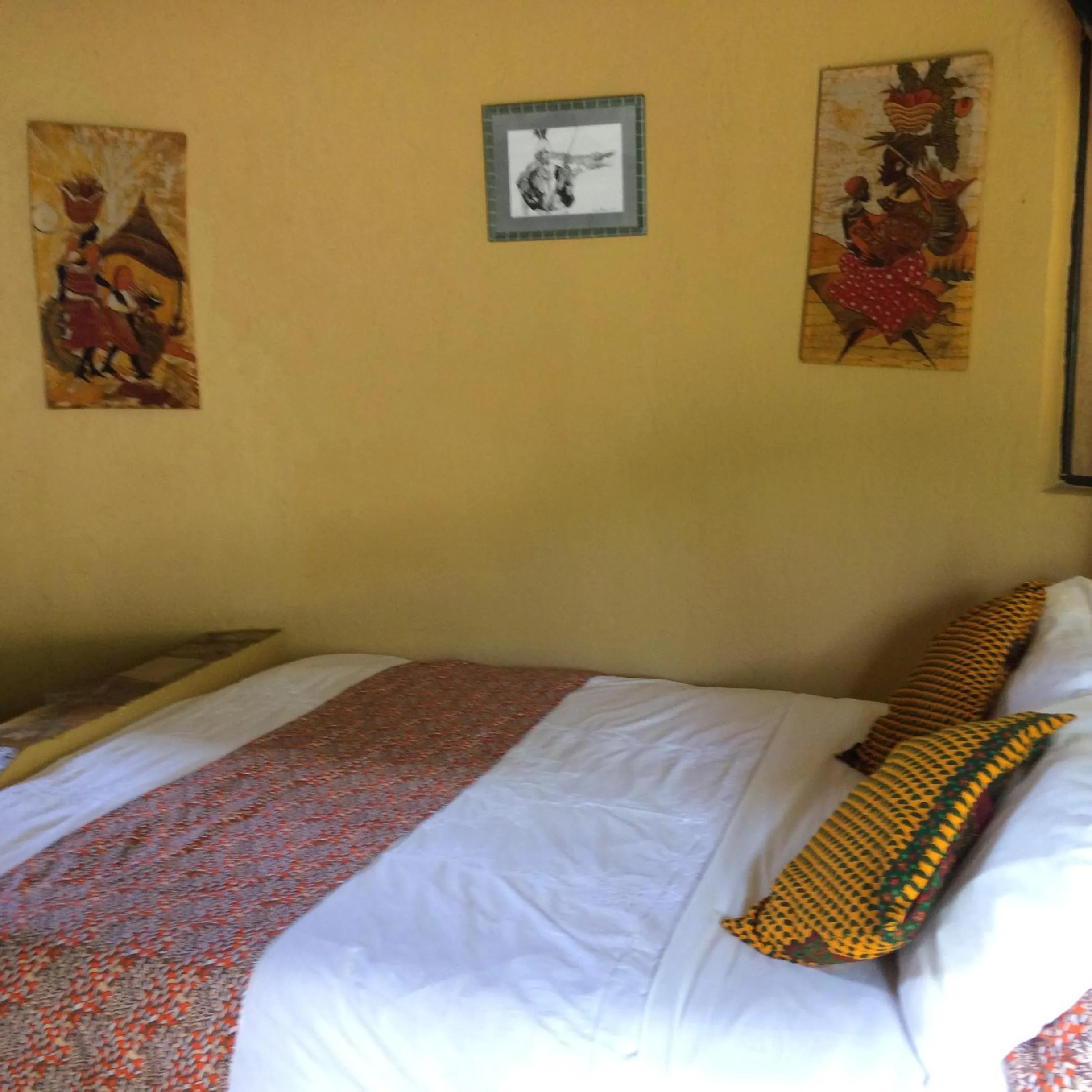 Bed in Nyore Hillside Retreat