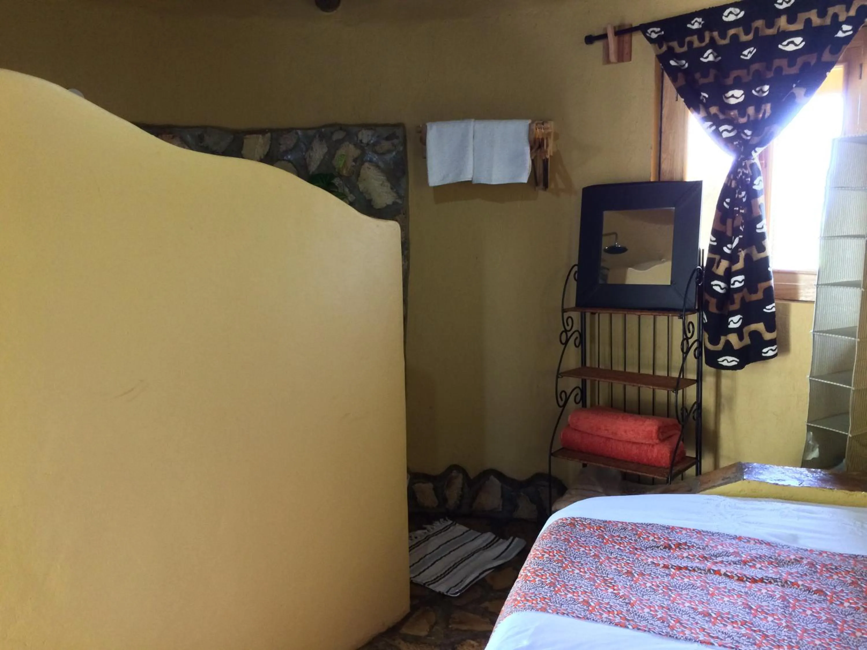 Bed in Nyore Hillside Retreat