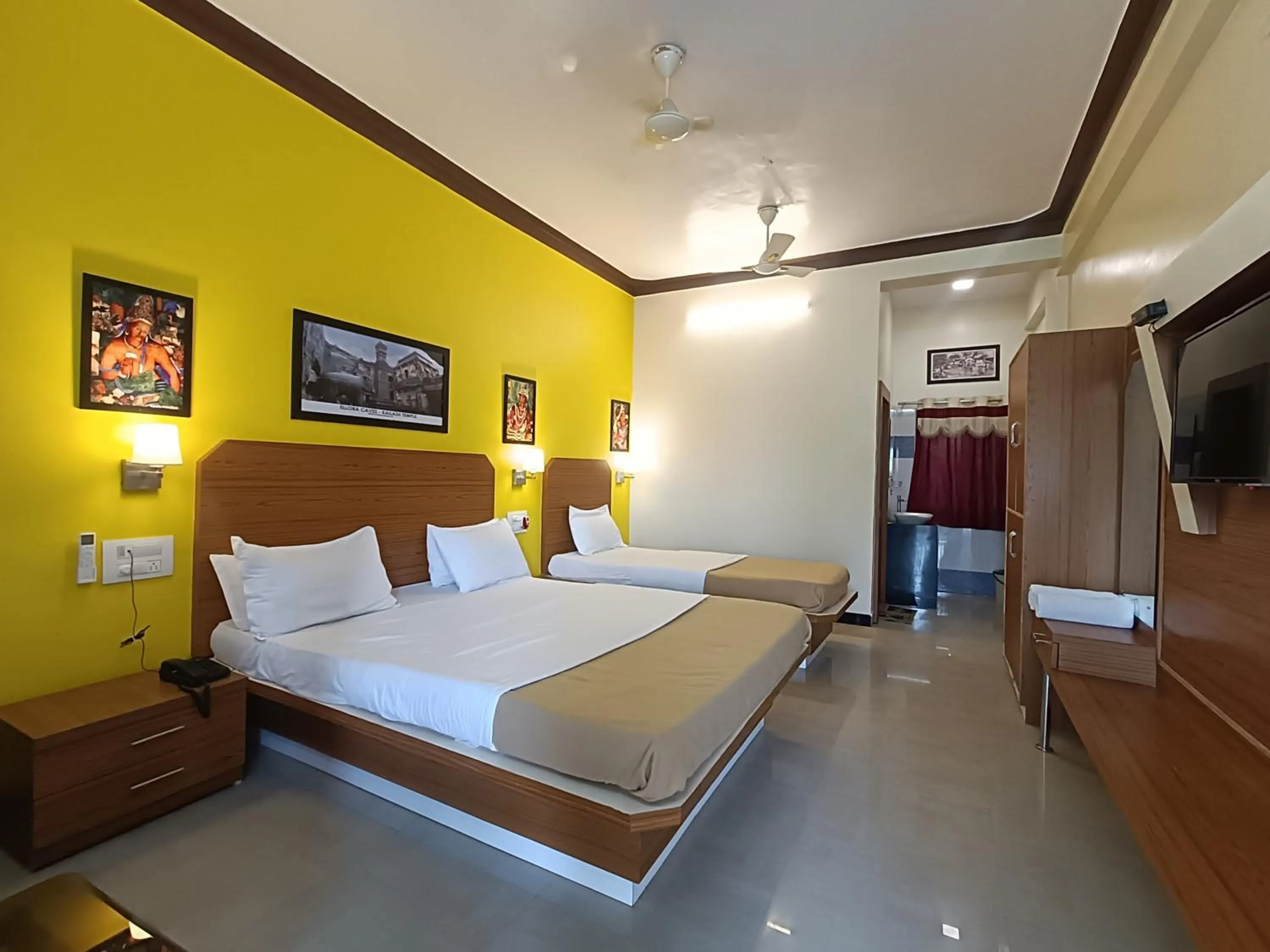 Bed in Ellora Heritage Resort