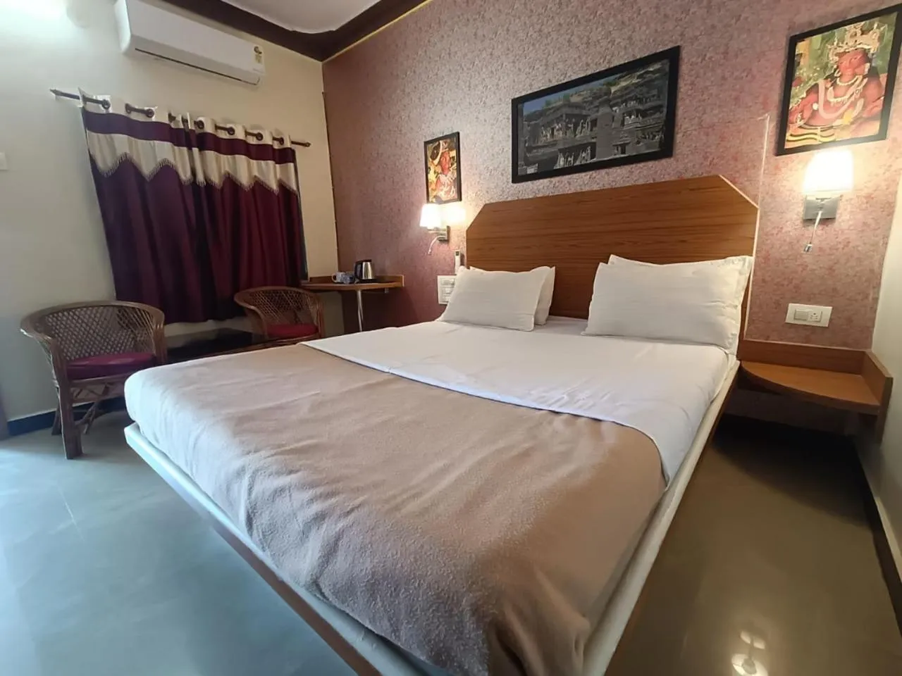 Bed in Ellora Heritage Resort