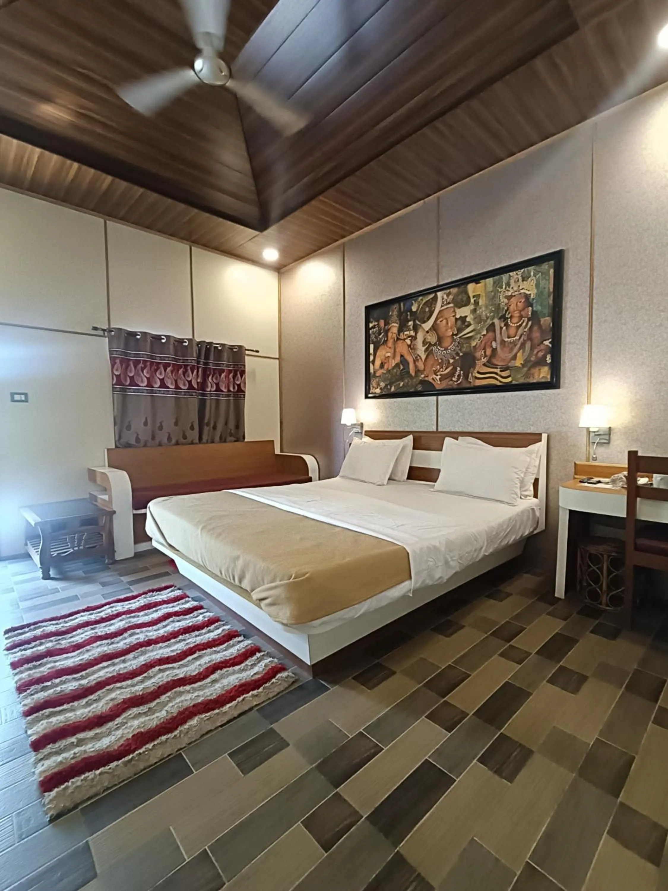 Bed in Ellora Heritage Resort