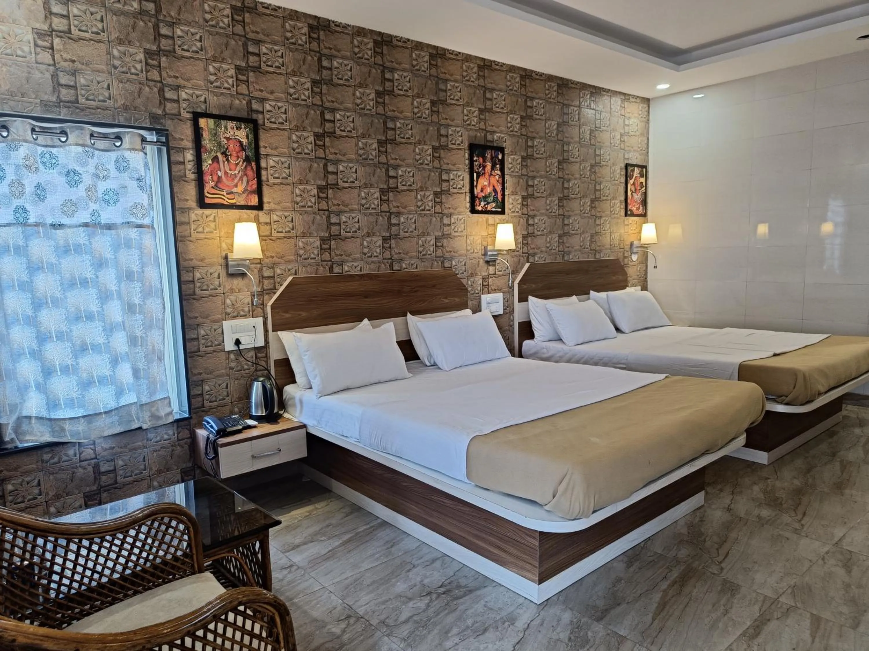 Bed in Ellora Heritage Resort