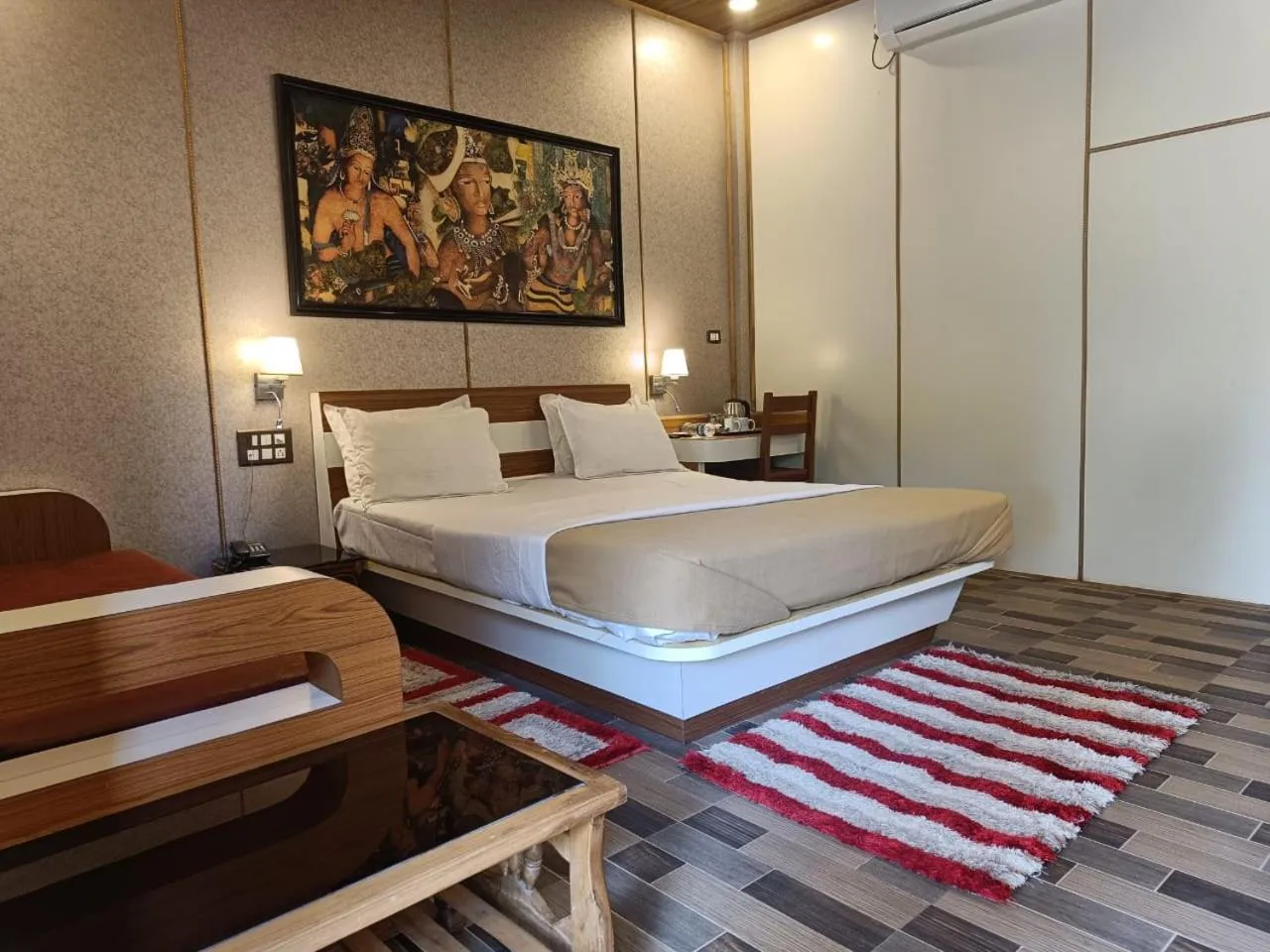 Bed in Ellora Heritage Resort