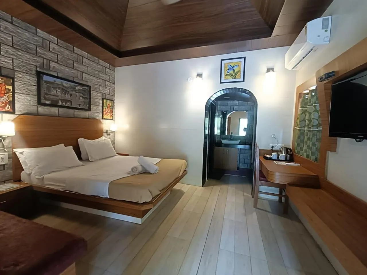 Bed in Ellora Heritage Resort