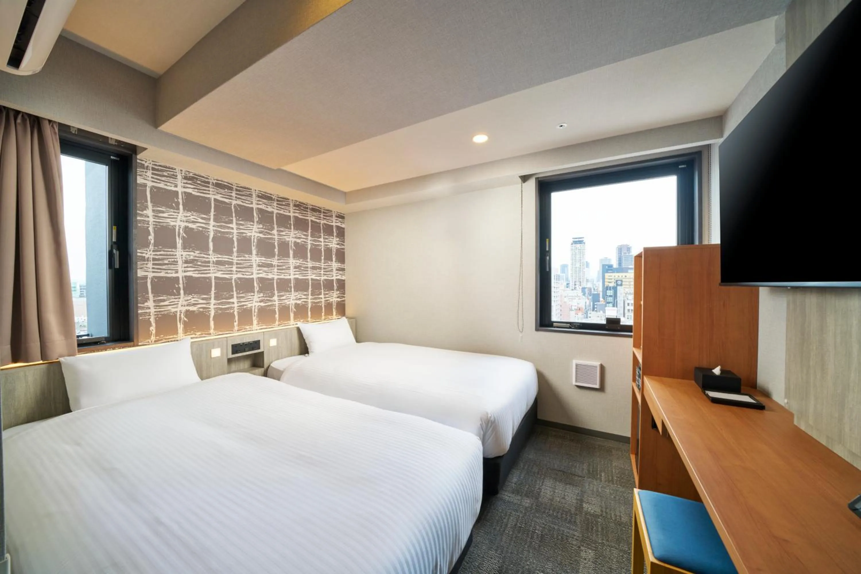 Photo of the whole room, Bed in KOKO HOTEL Osaka Namba Sennichimae
