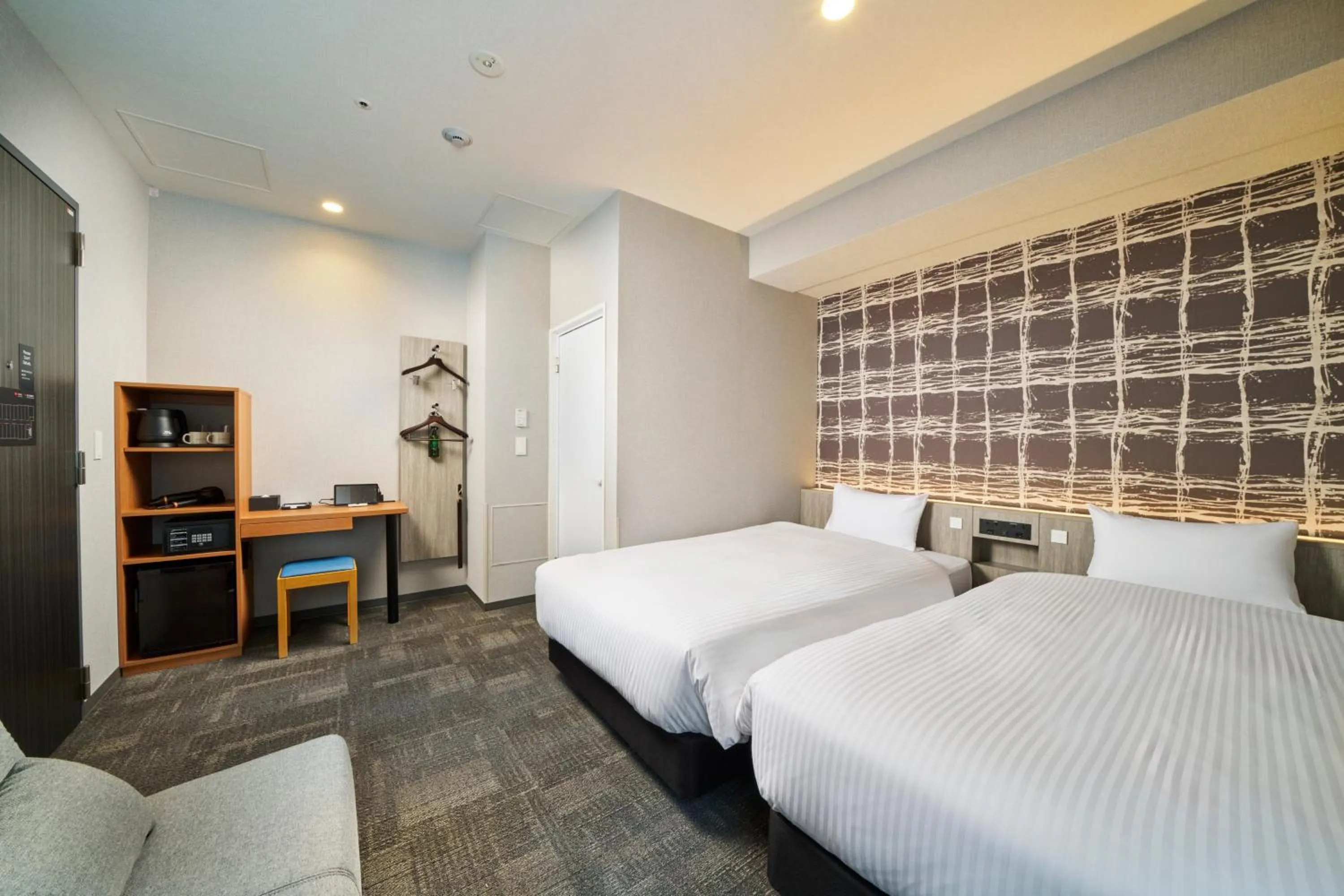 Photo of the whole room, Bed in KOKO HOTEL Osaka Namba Sennichimae