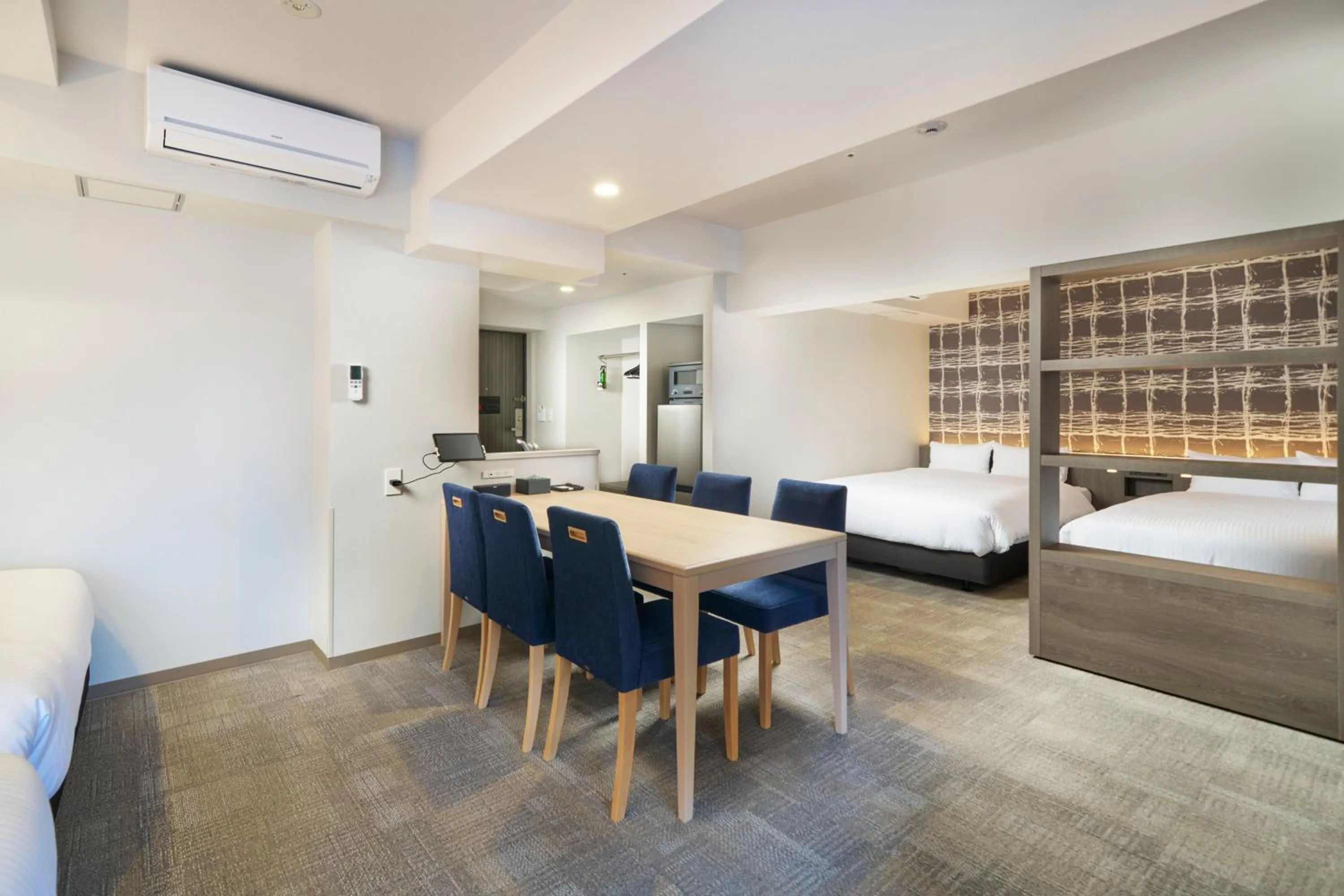 Photo of the whole room, Bed in KOKO HOTEL Osaka Namba Sennichimae