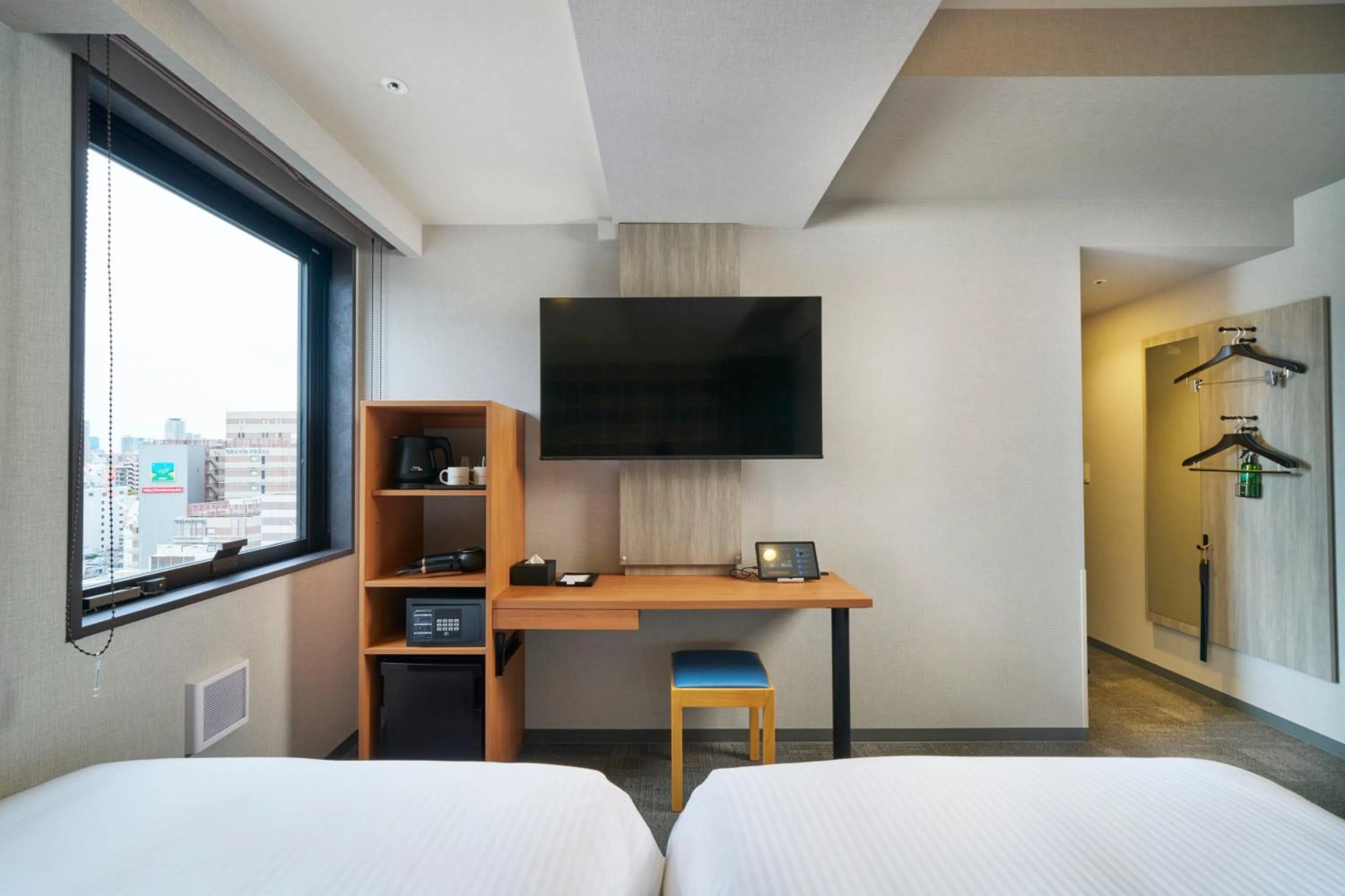 Photo of the whole room, Bed in KOKO HOTEL Osaka Namba Sennichimae