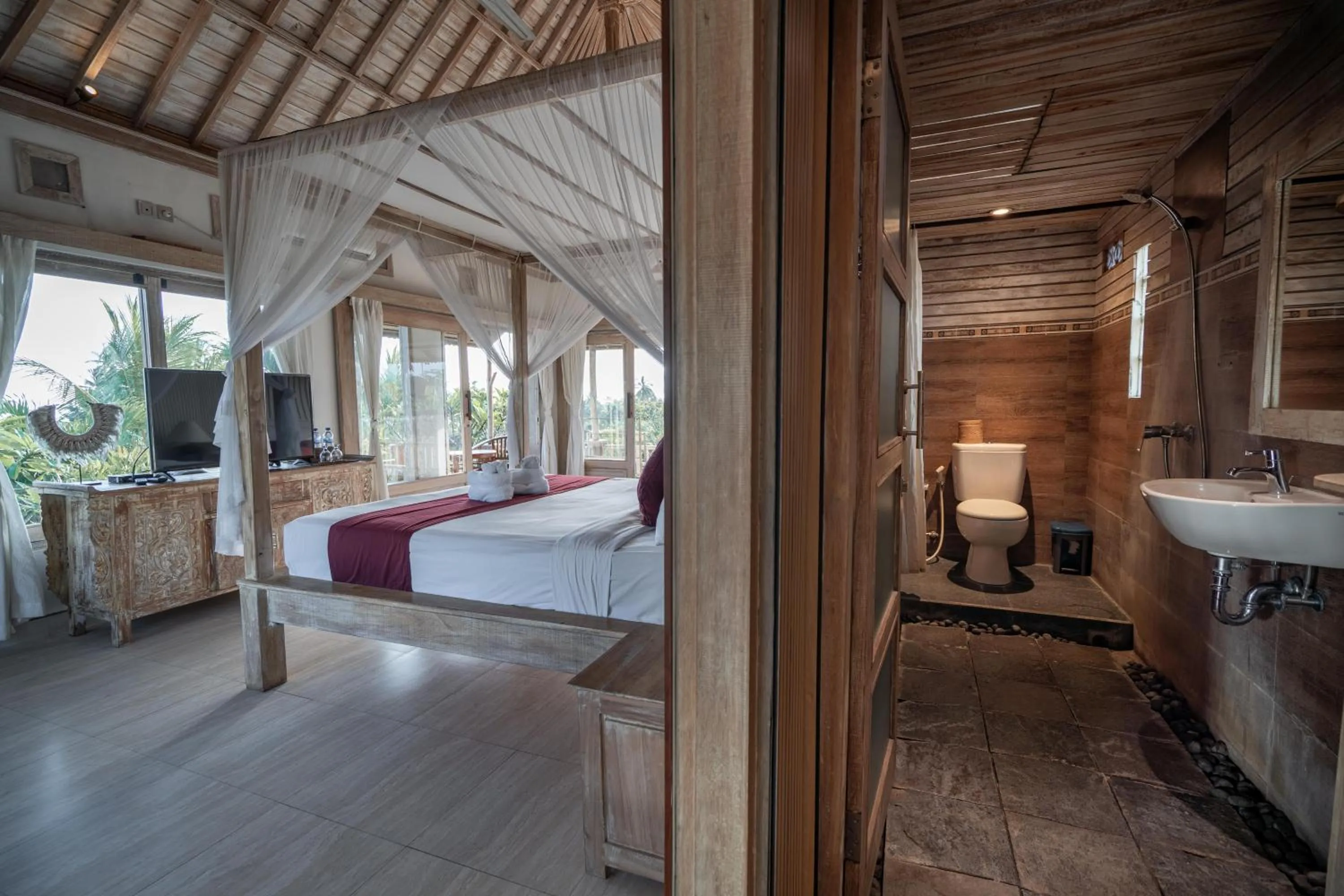 Bed in Uma Caming Villa Ubud