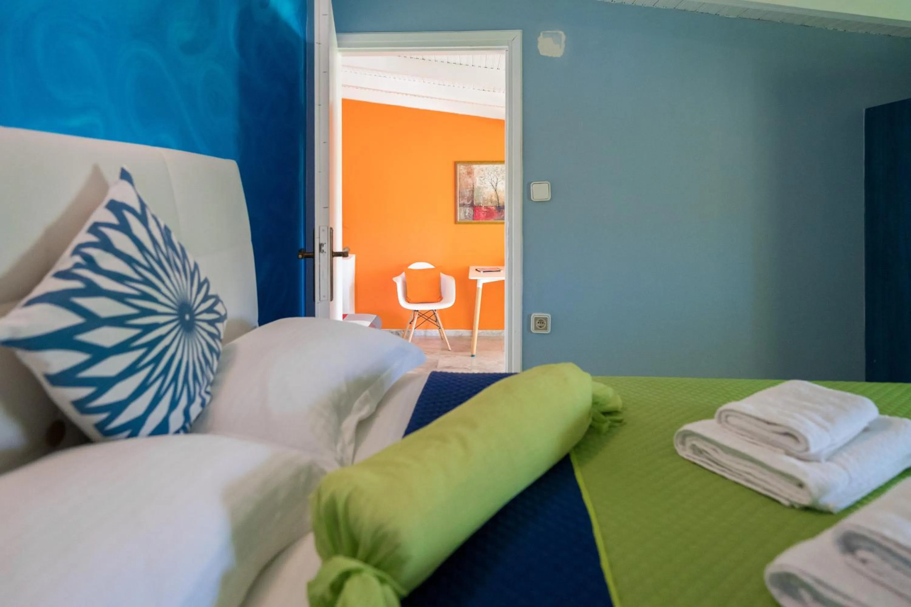 Bed in Poseidon Apartments