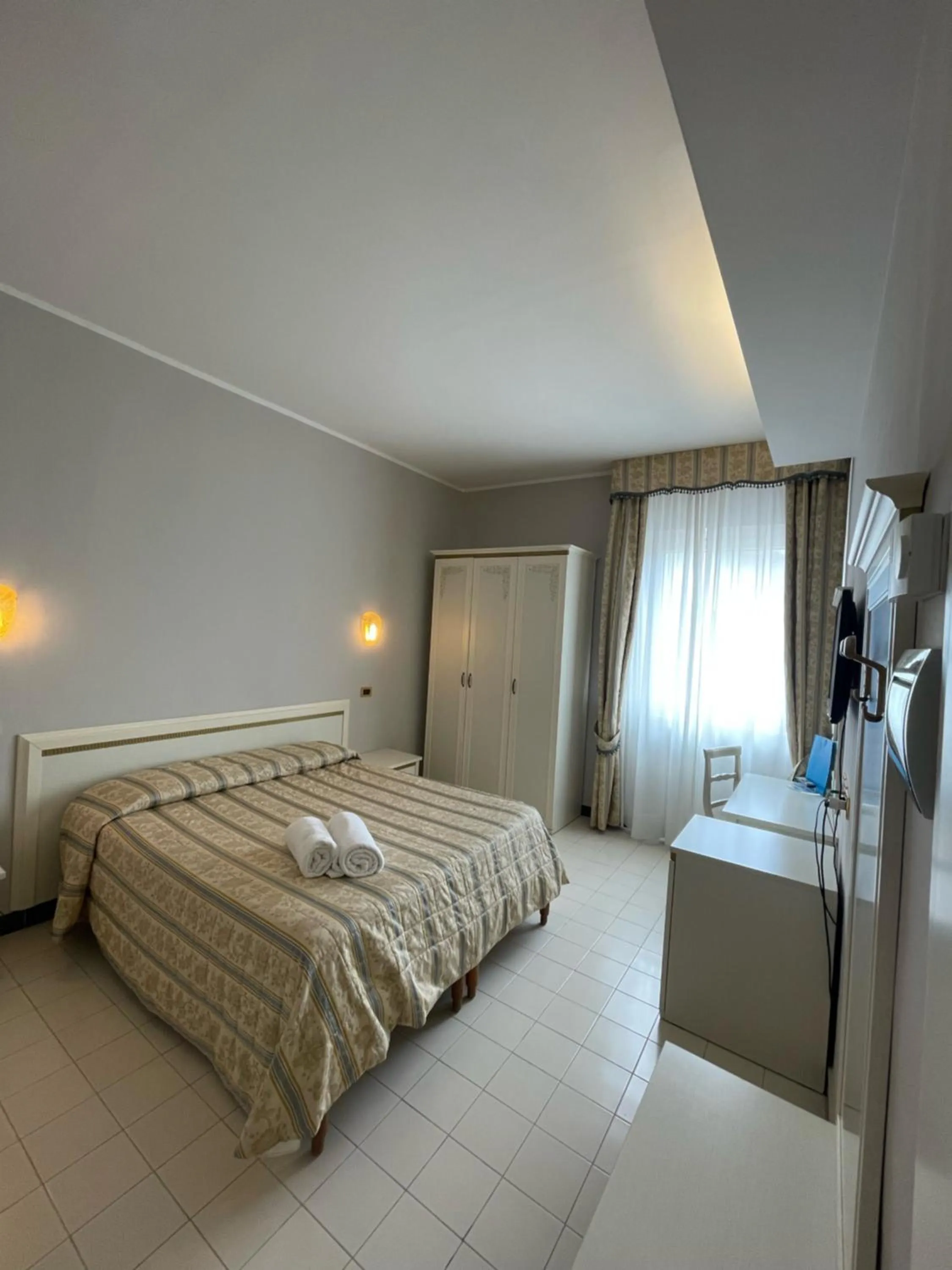 Bed in Platani Hotel