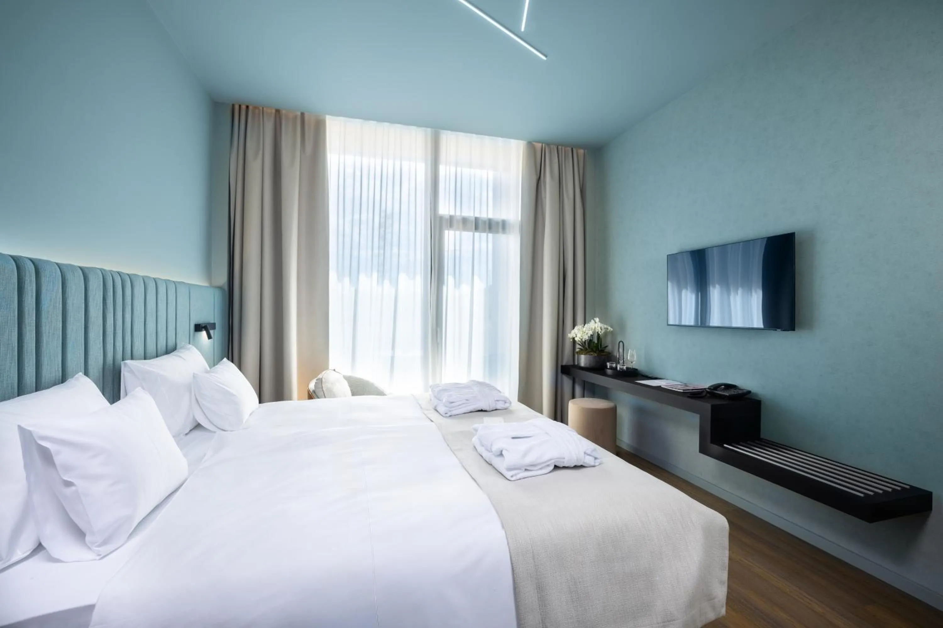 Communal lounge/ TV room, Bed in Viale Boutique Hotel