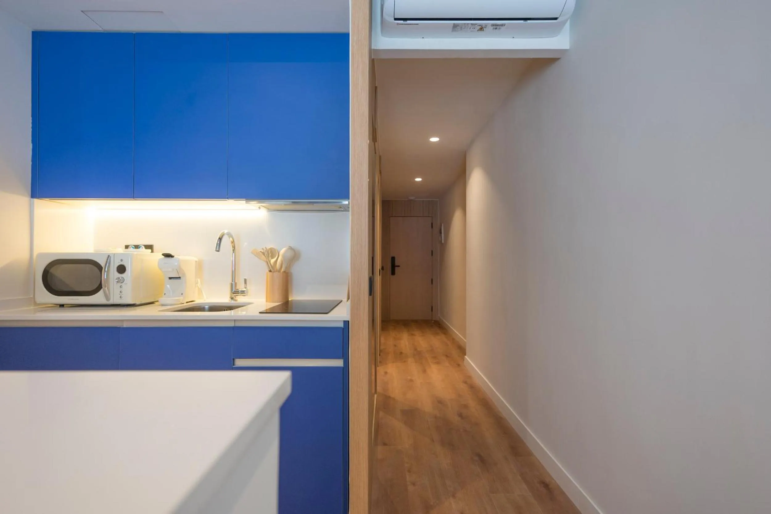 kitchen in Iconic Suites