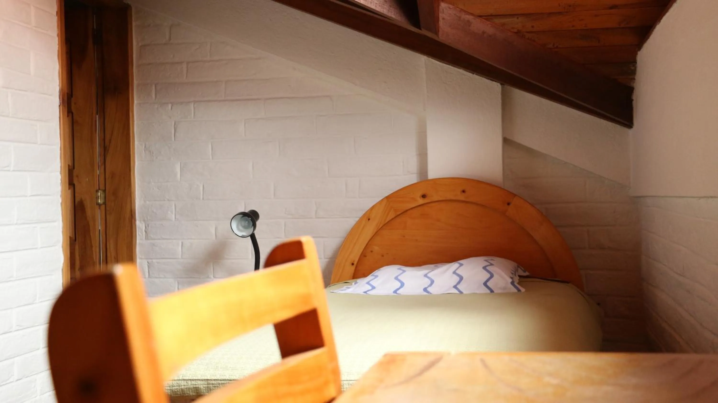 Bed in Apartamentos Los Quipus