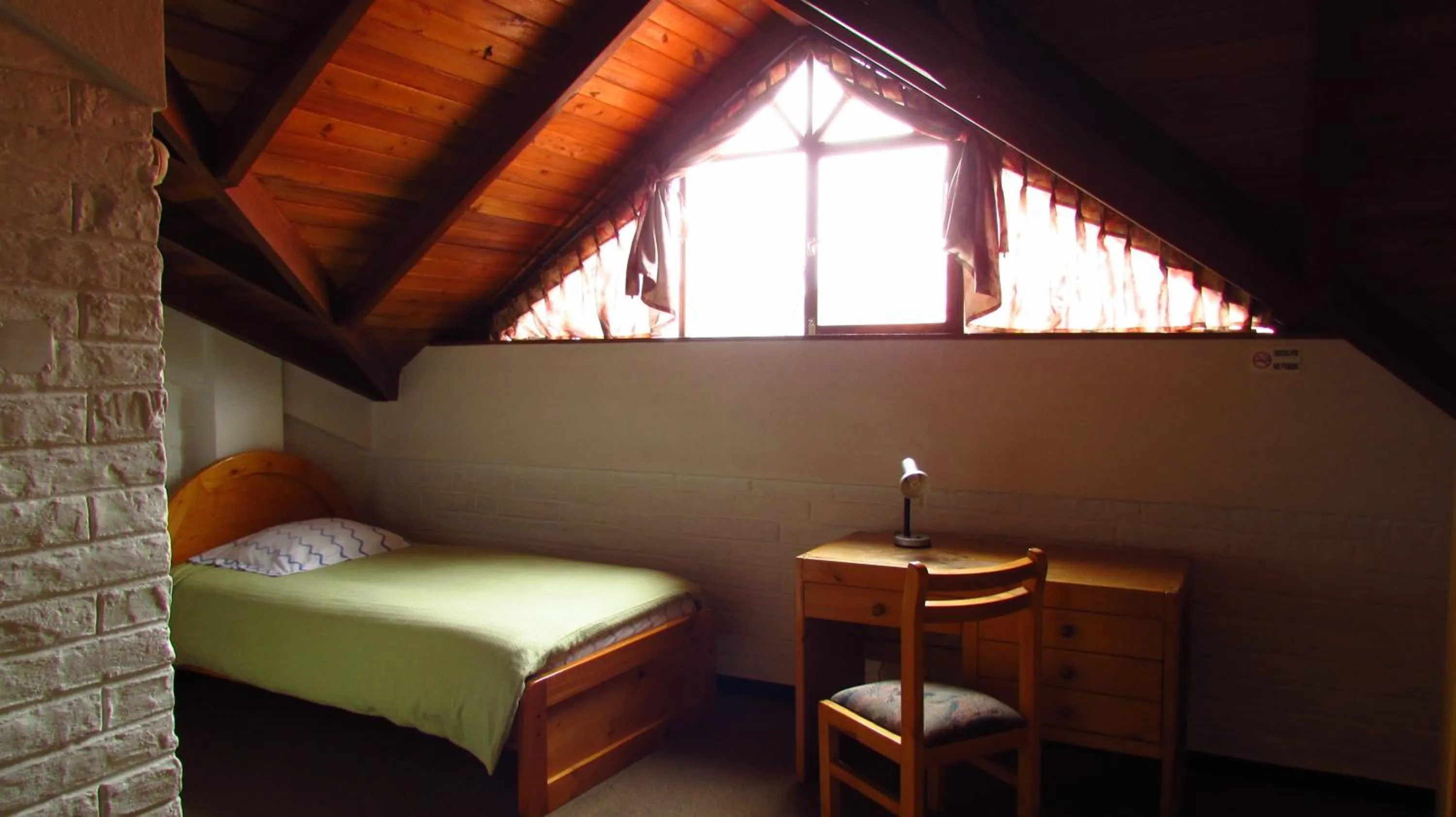 Bed in Apartamentos Los Quipus